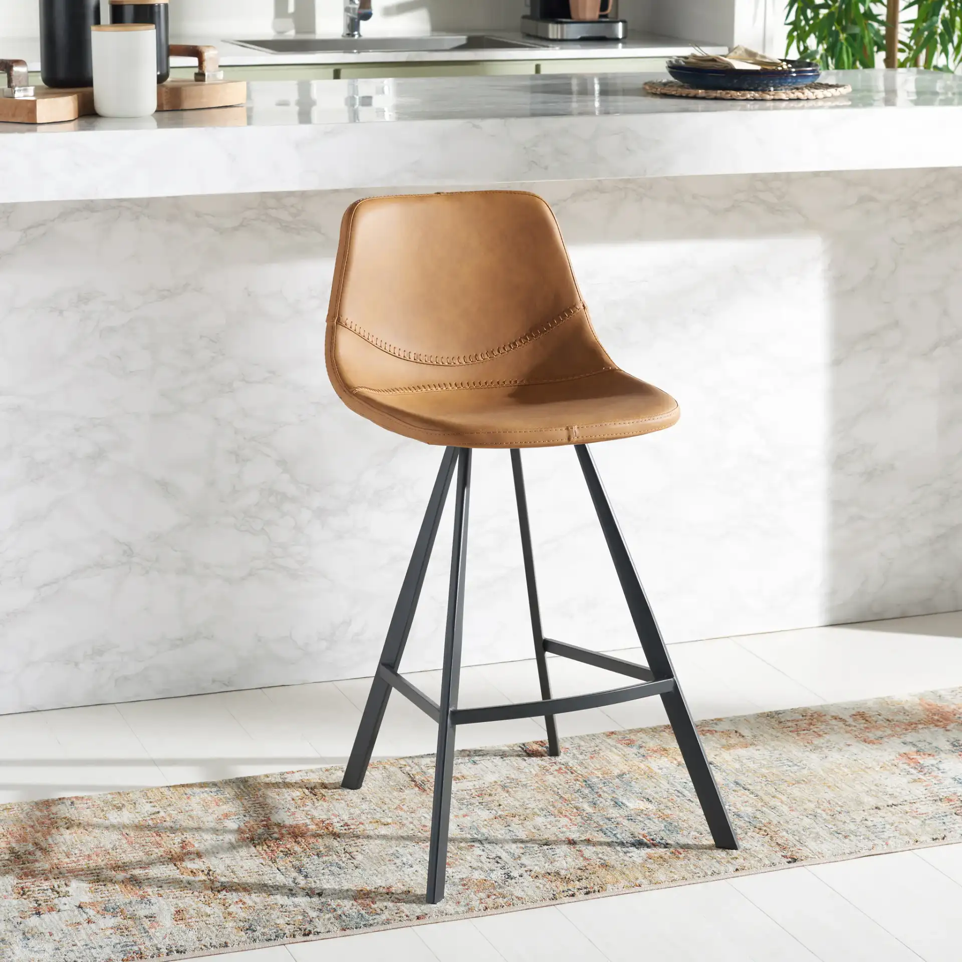 Ryanne Counter Stool in Cognac / Black in a styled room