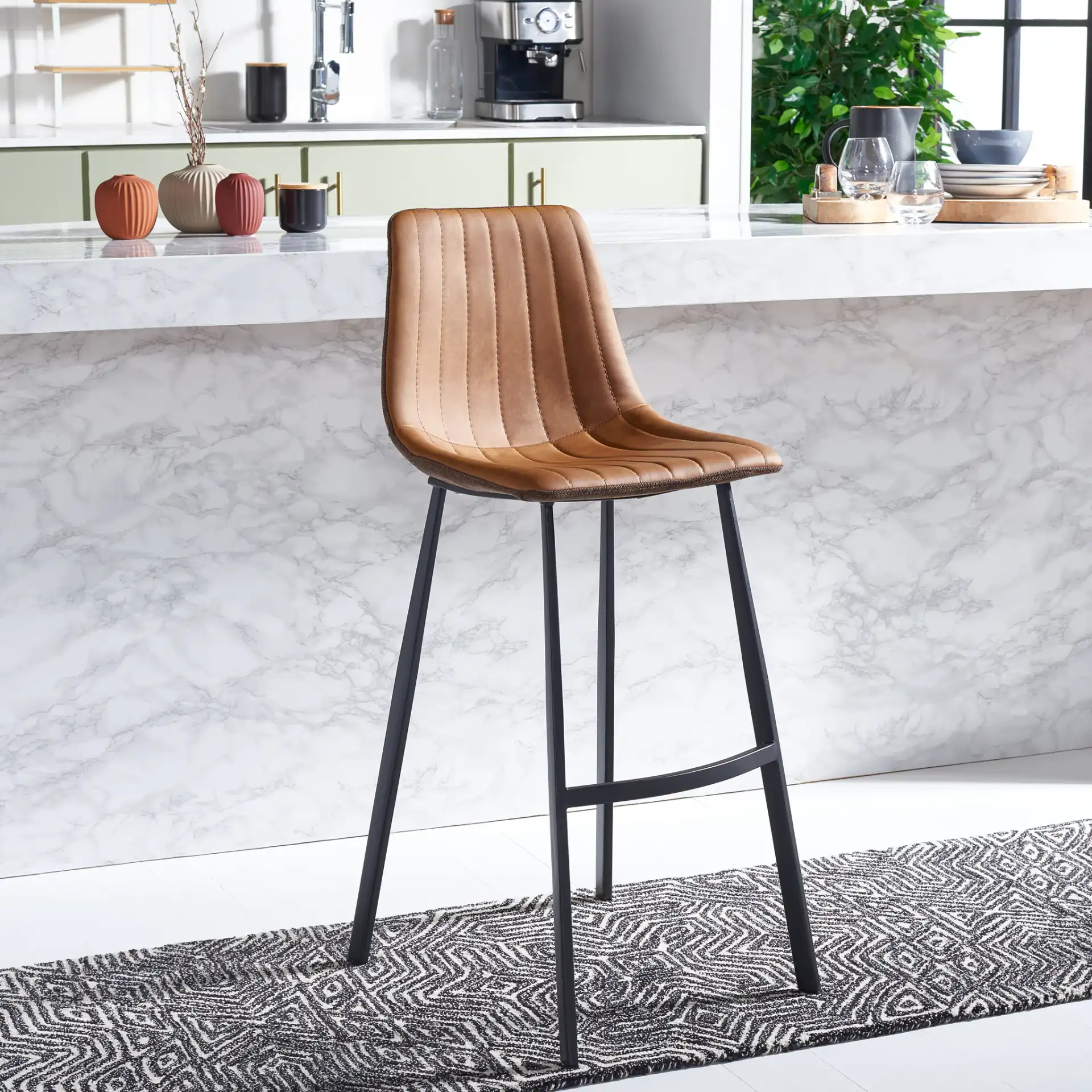 Rhyatte Bar Stool in Gray / Black in a styled room