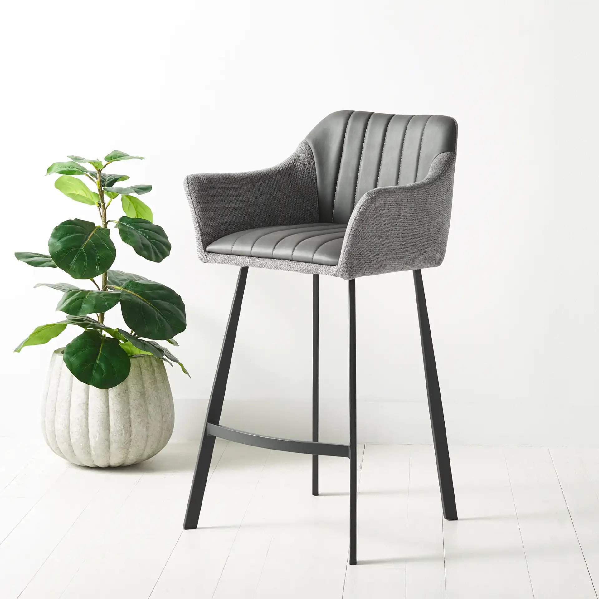 Rodi Counter Stool in Gray / Black in a styled room