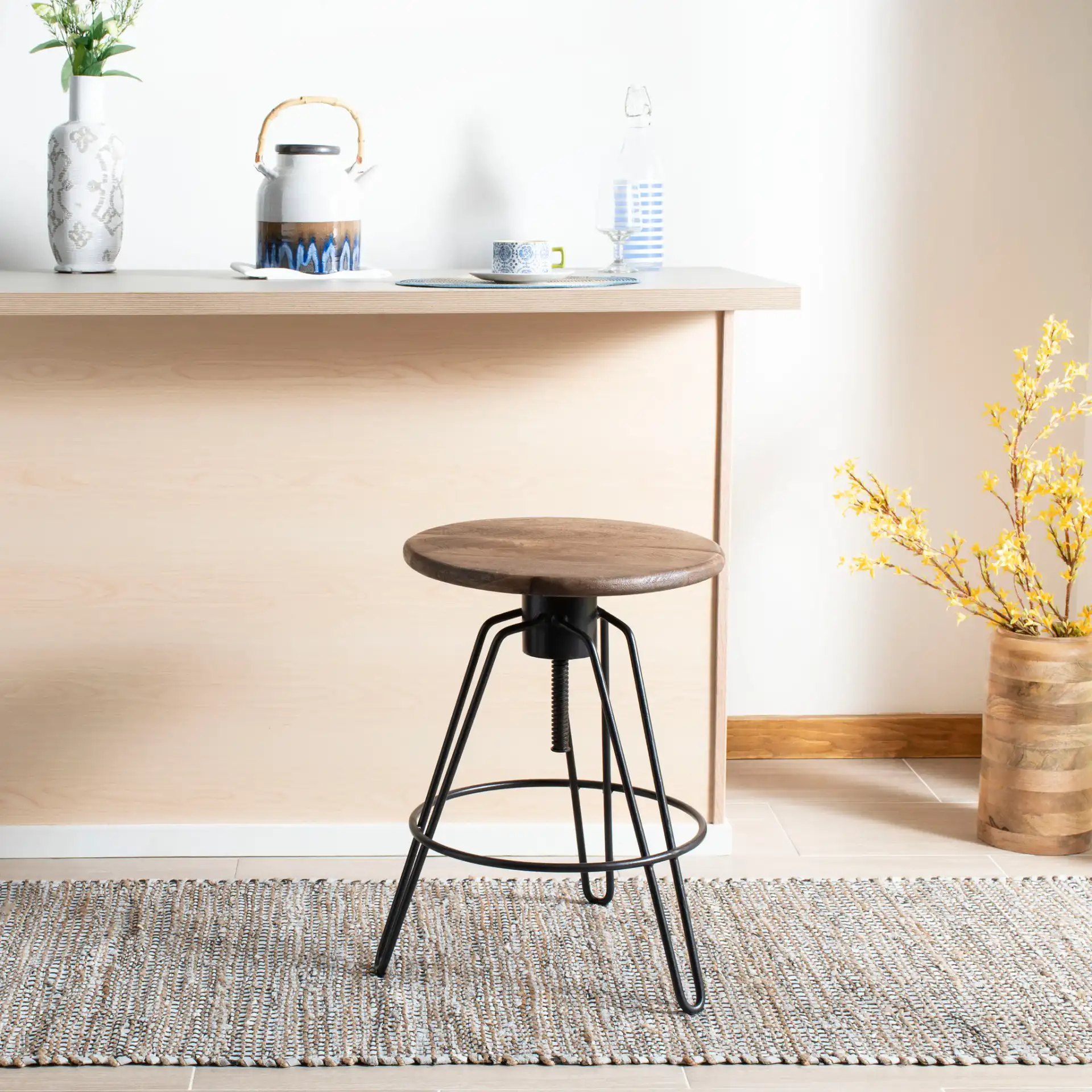 Kai Swivel Counterstool in Natural Honey / Black in a styled room