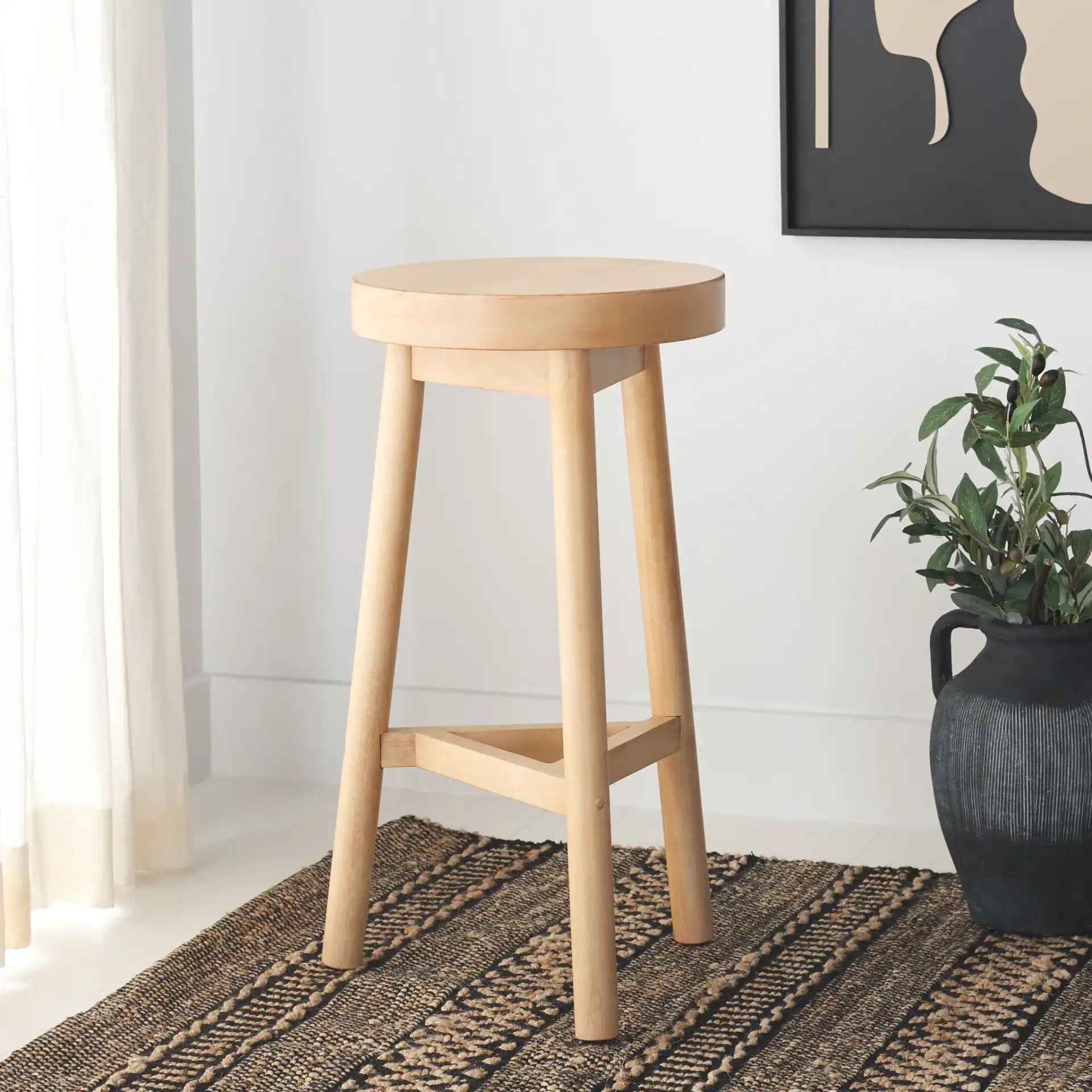 Andrius Counter Stool in Natural in a styled room