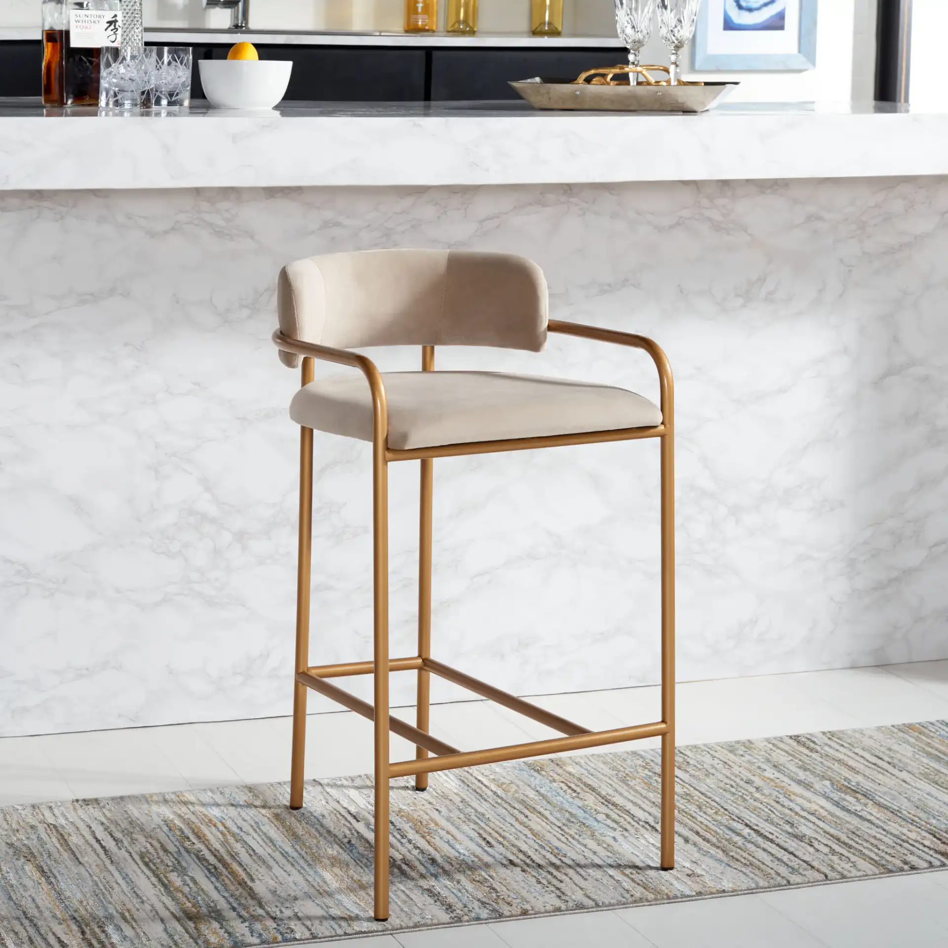 Camille Counter Stool in Dark Gray / Gold in a styled room