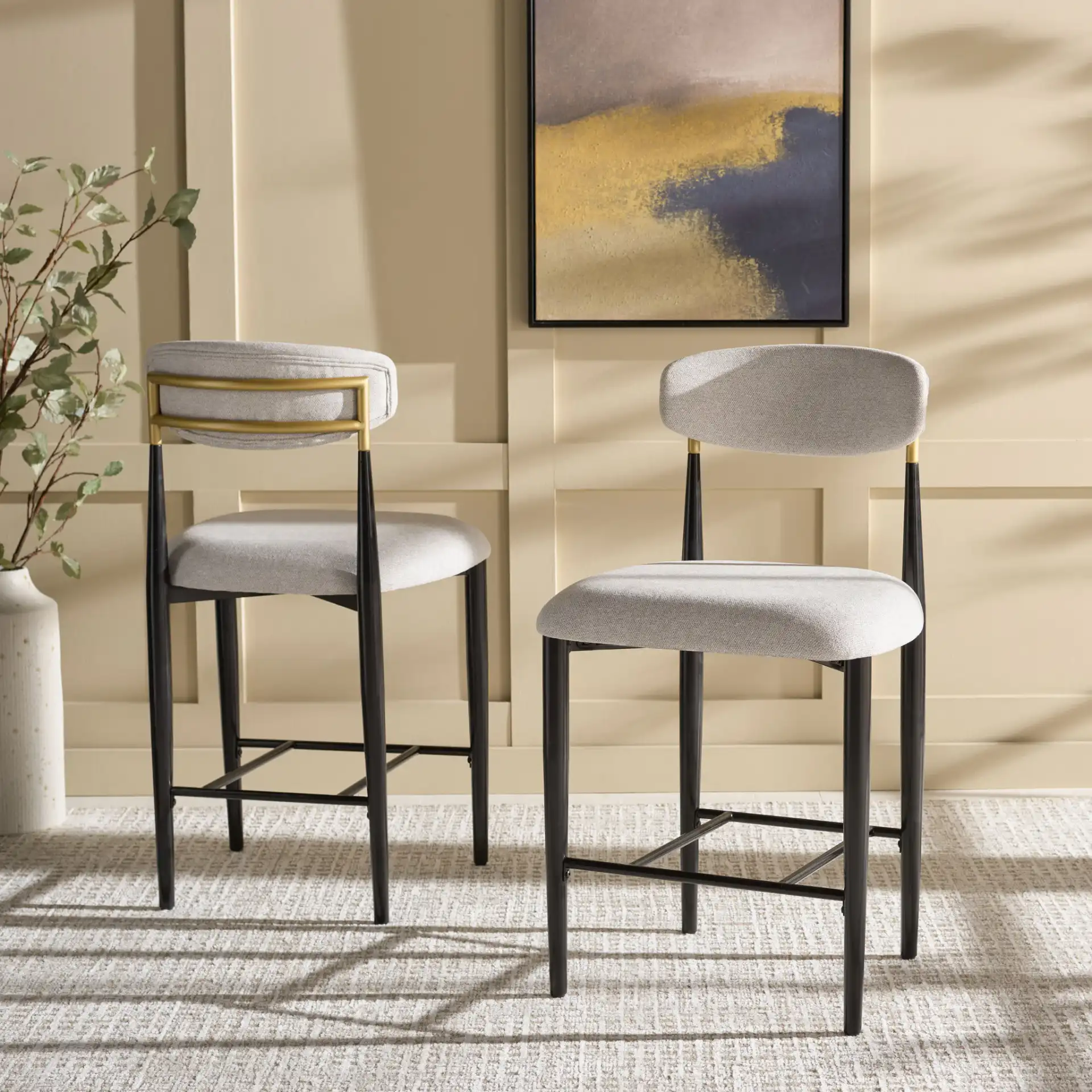 Covelle Counter Stool (Set of 2) in Black Gold / Dove Gray in a styled room