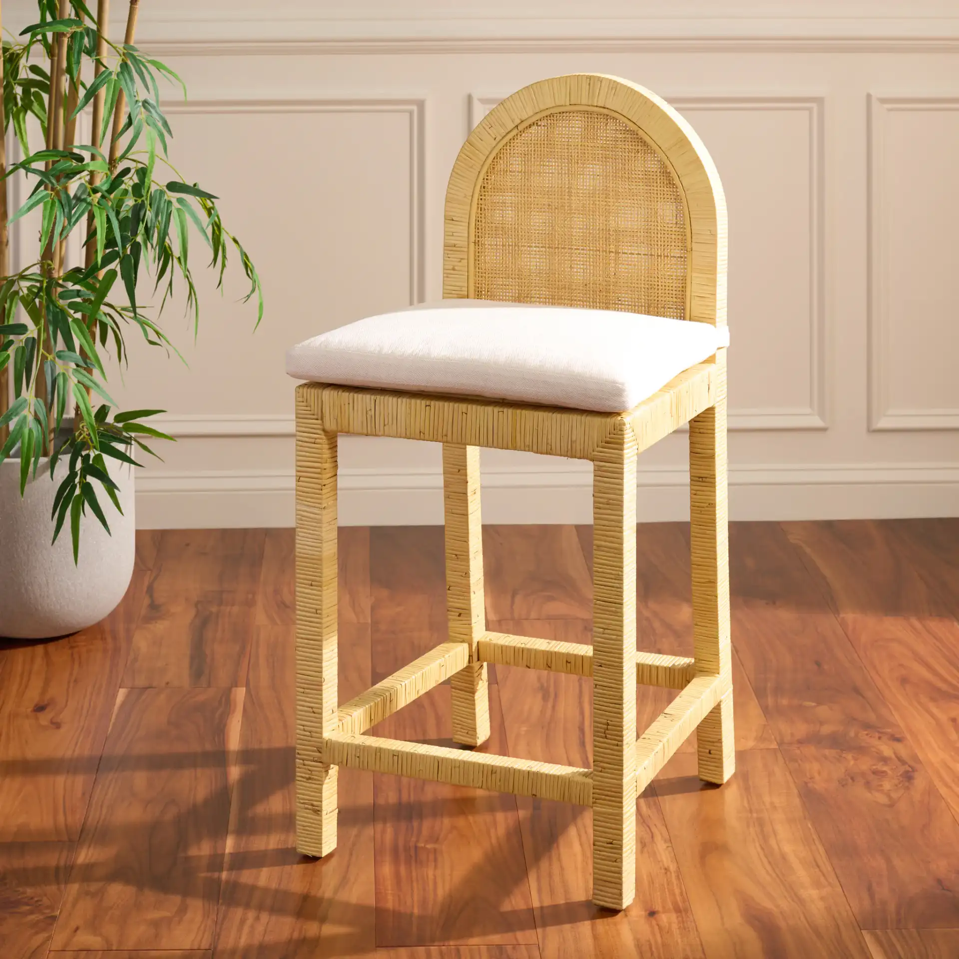 Tojo Cane Roundback Counter Stool in Natural / White in a styled room