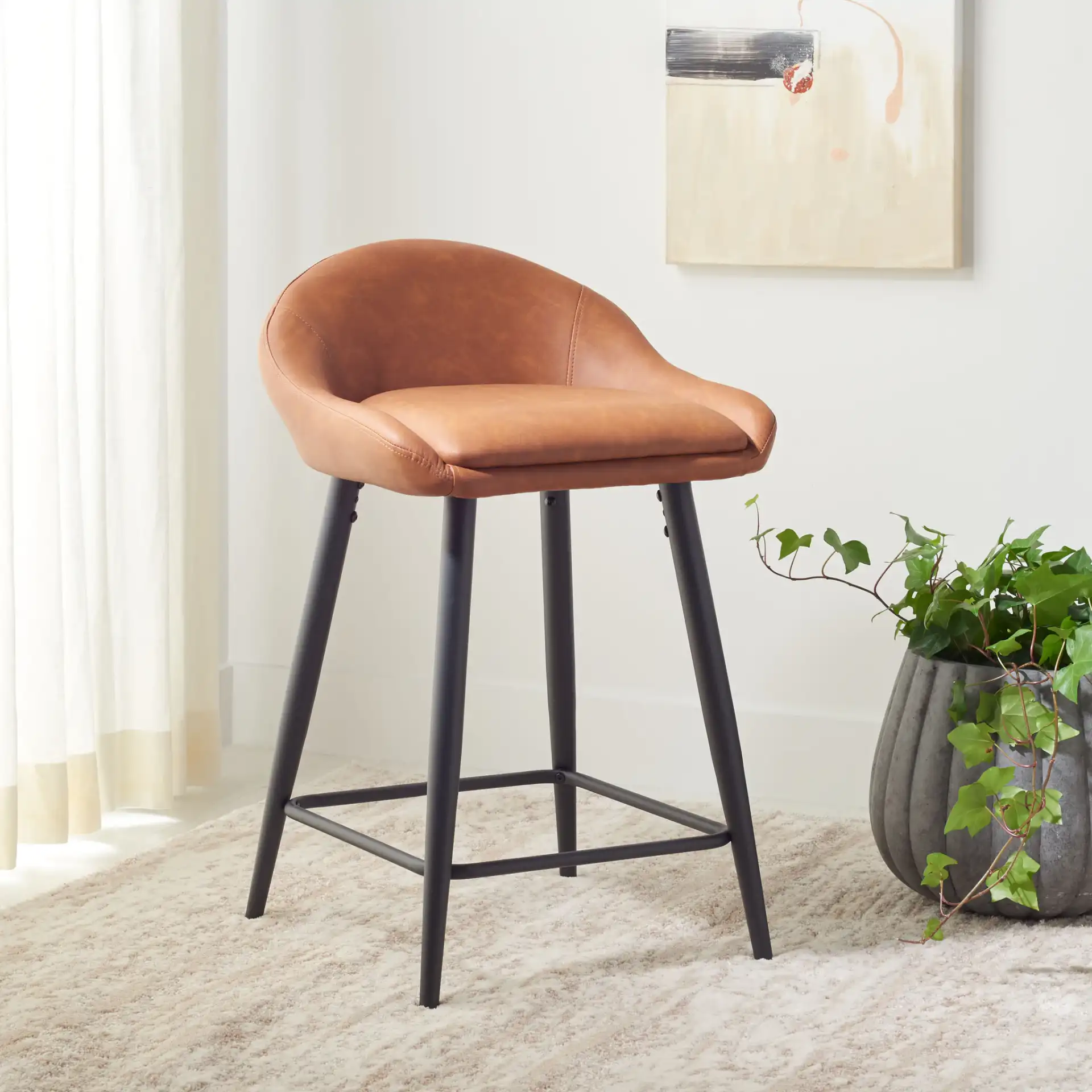 Anson Counter Stool in Cigar / Black in a styled room