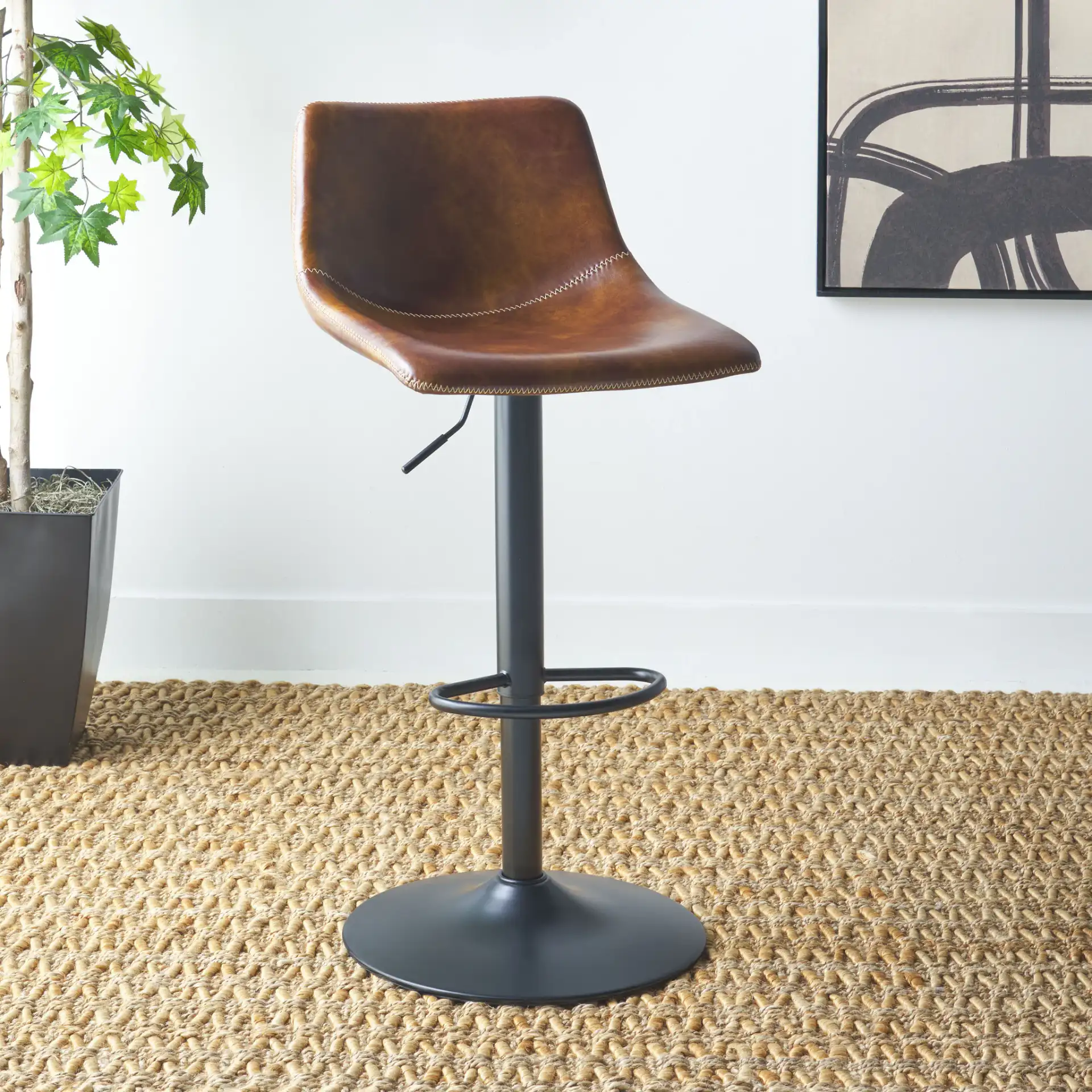 Aelin Adjustable Bar Stool in Brown / Black in a styled room