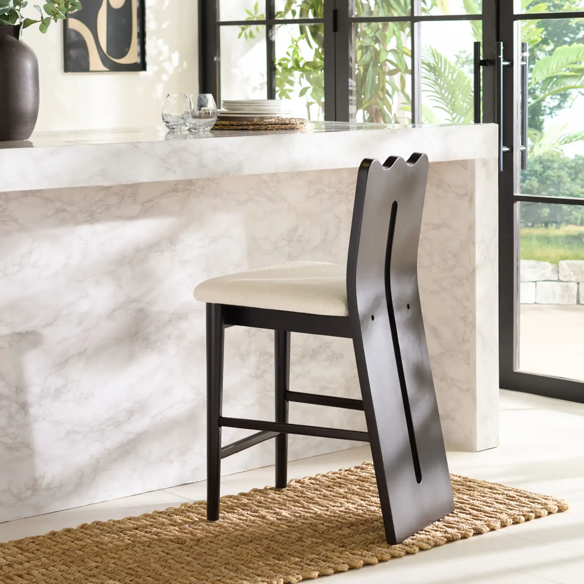 Kieran Counter Stool in Cream / Black in a styled room