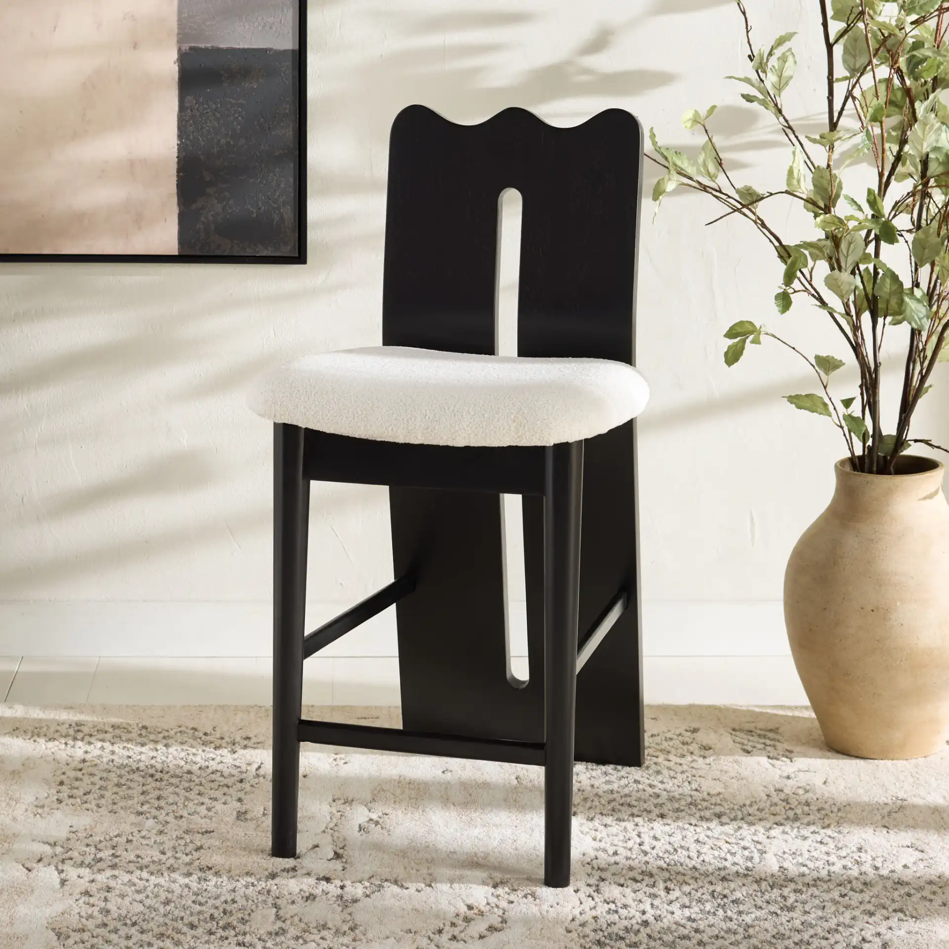 Kieran Counter Stool in Cream / Black in a styled room