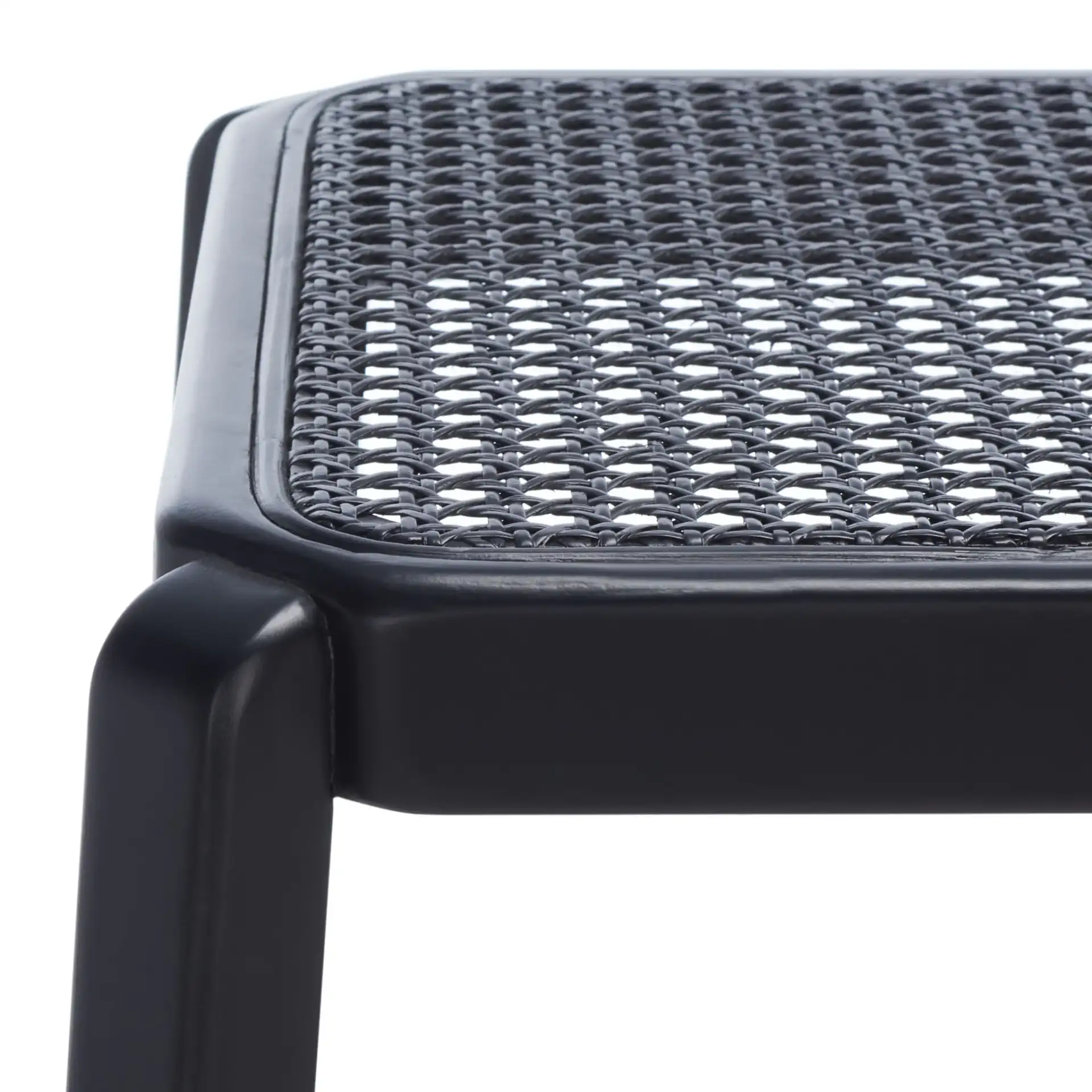 Silus Backless Cane Counter Stool in Black in a styled room