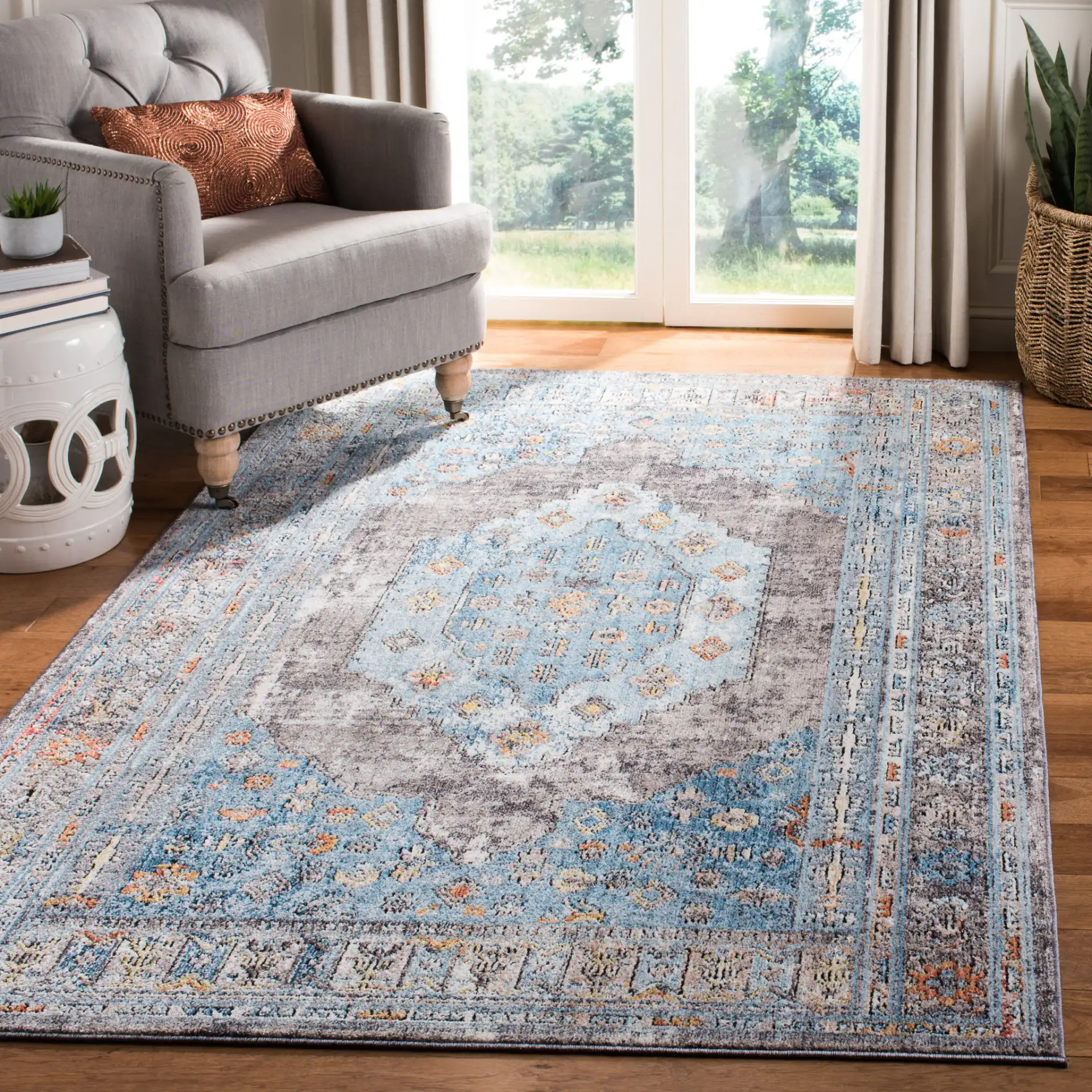 Bristol Stepped Medallion Rug in Gray / Blue in a styled room