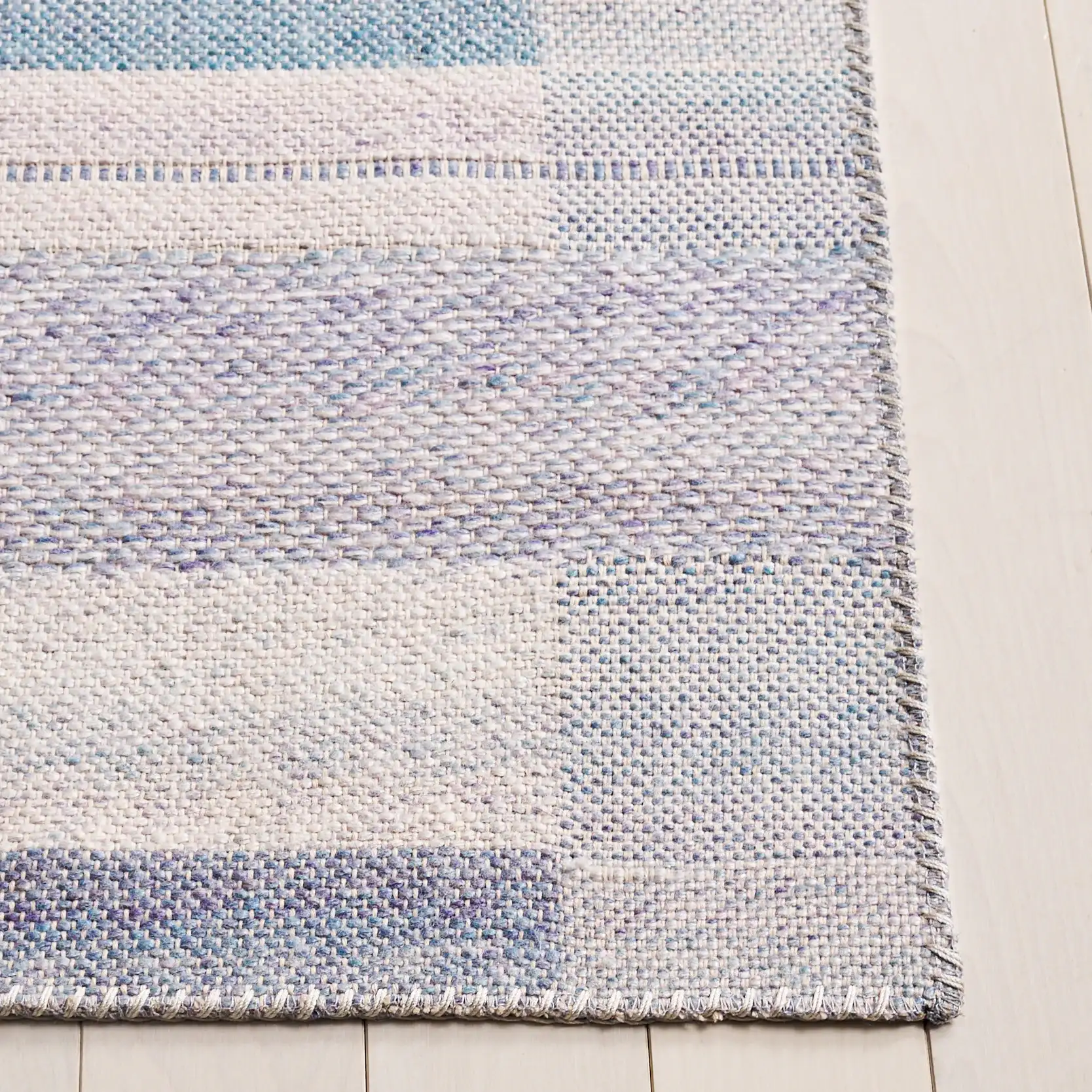 Cabo Striped Border Rug in Blue / Purple