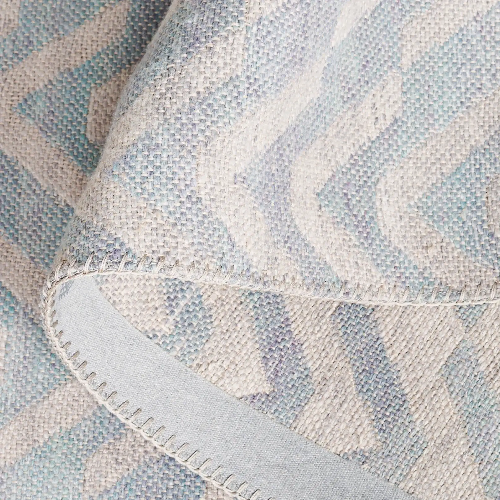 Cabo Chevron Rug in Light Blue / Beige in a styled room