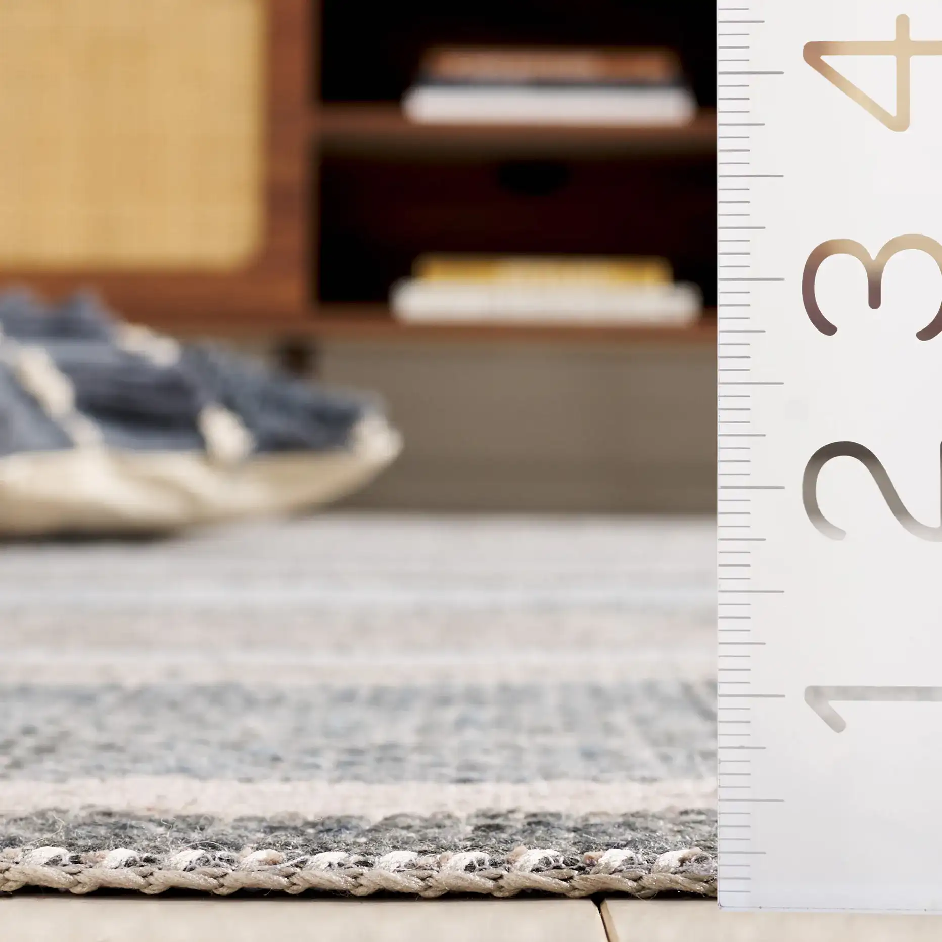 Cabo Striped Rug in Black / Light Blue in a styled room