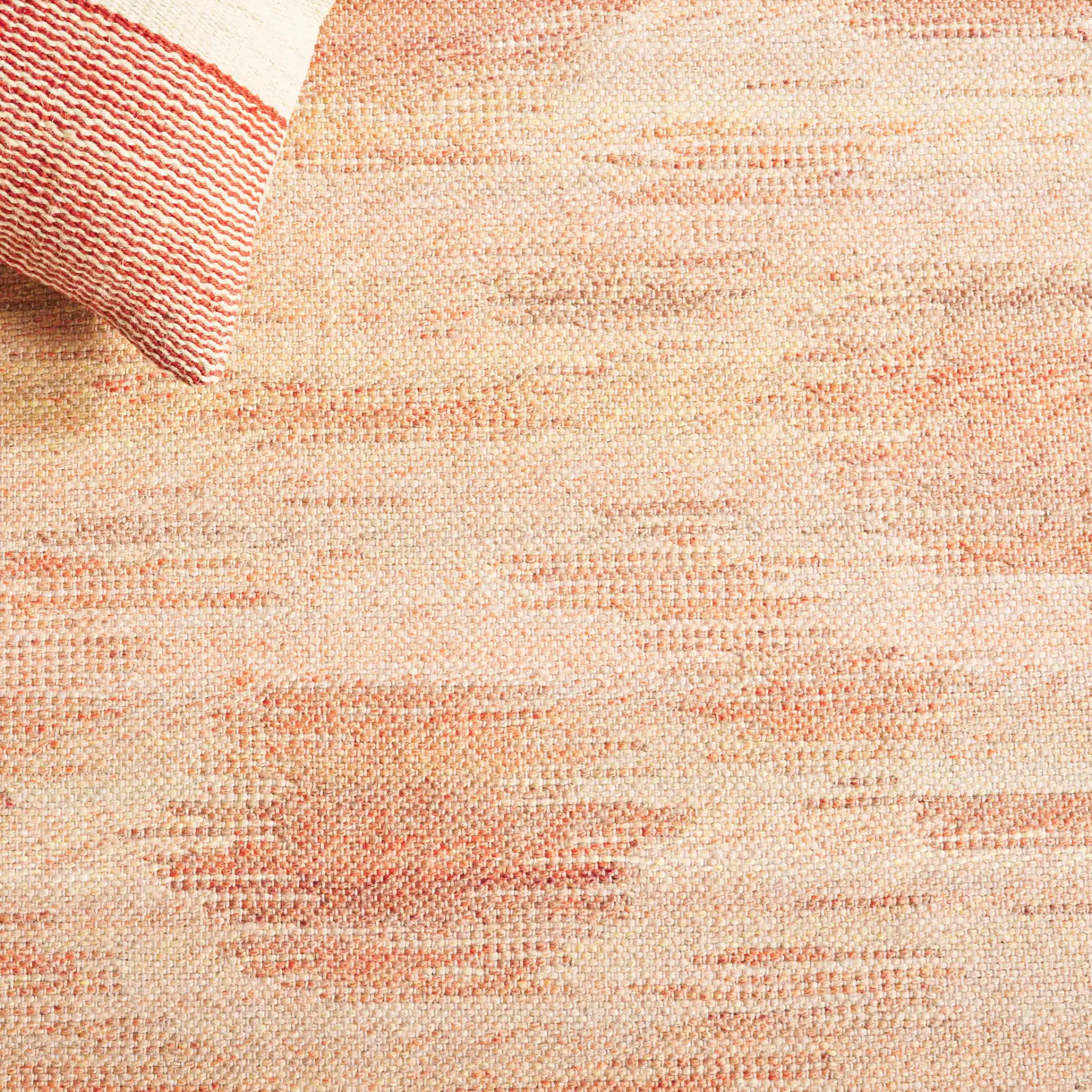 Cabo Blurred Diamond Rug in Red / Beige in a styled room