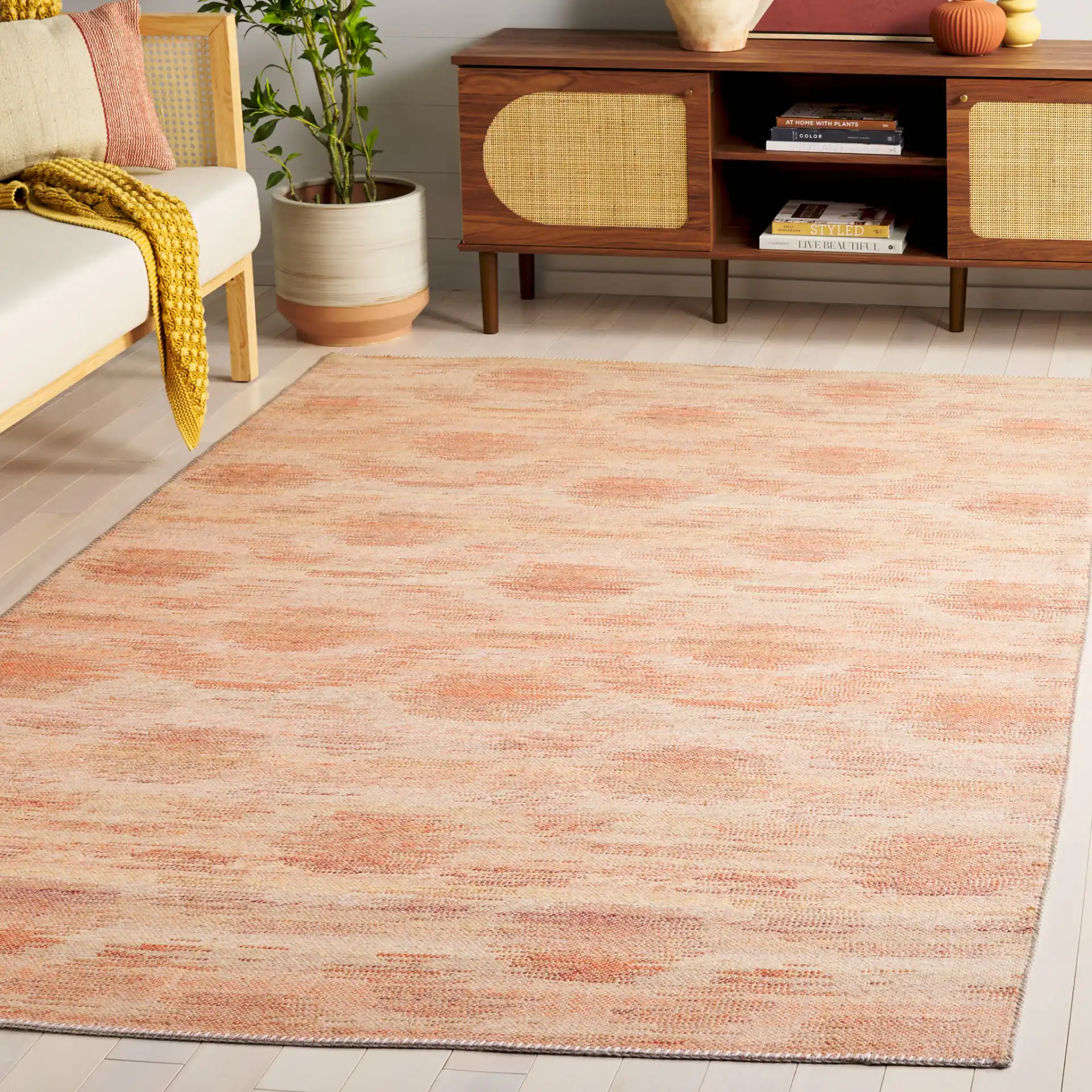 Cabo Blurred Diamond Rug in Red / Beige in a styled room