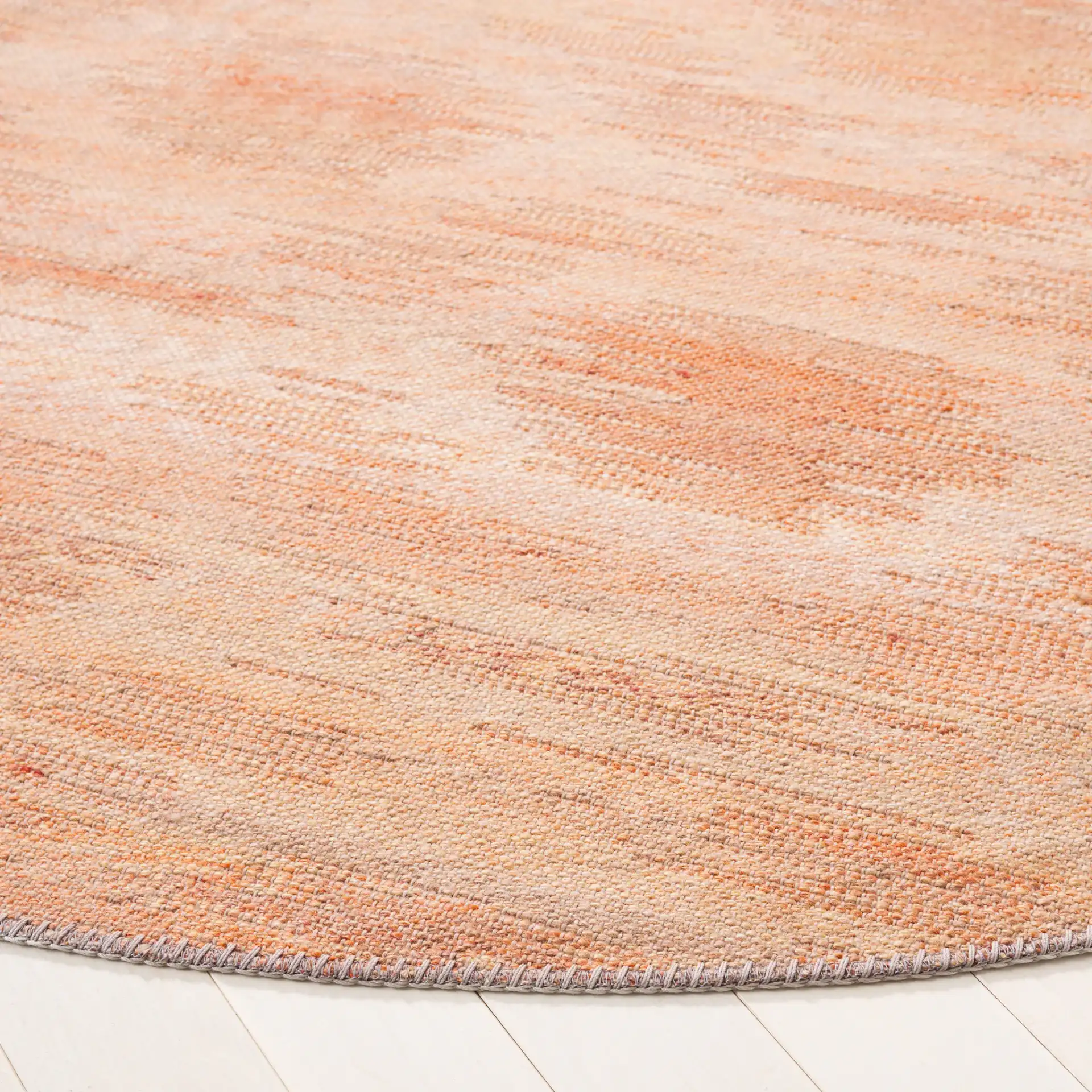 Cabo Blurred Diamond Rug in Red / Beige in a styled room