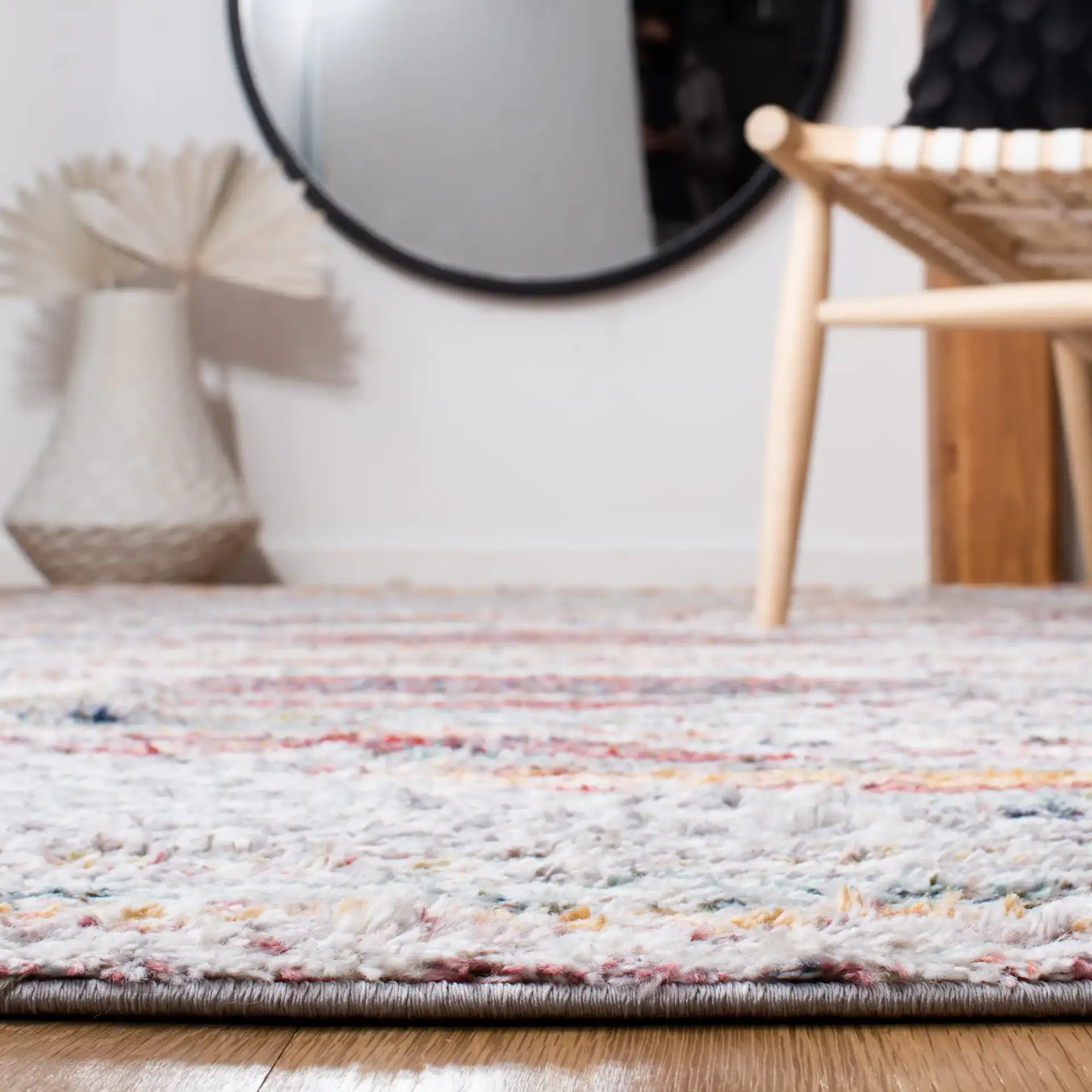 Calista Diamond Medallion Shag Rug in Ivory / Rust in a styled room