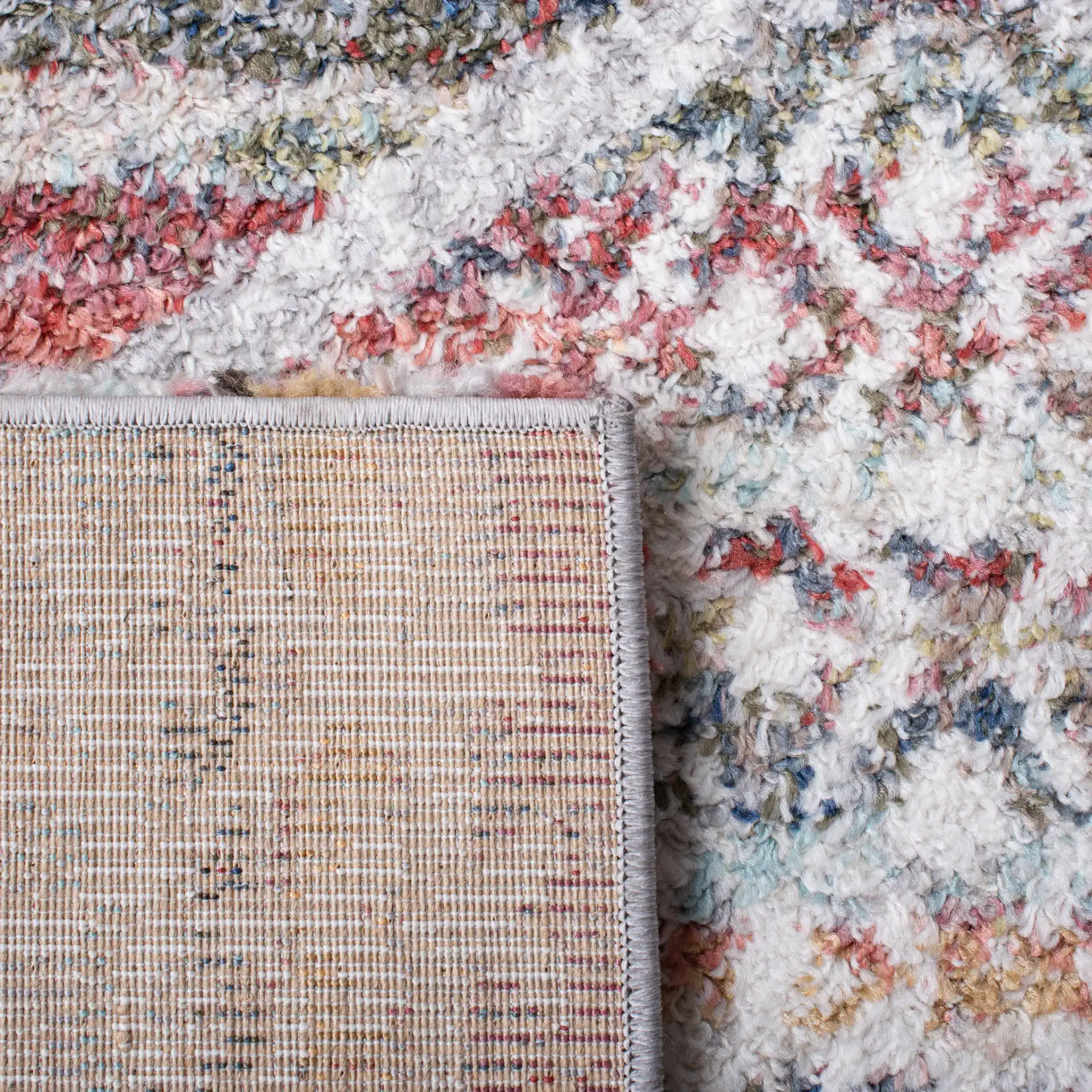 Calista Diamond Medallion Shag Rug in Ivory / Rust in a styled room