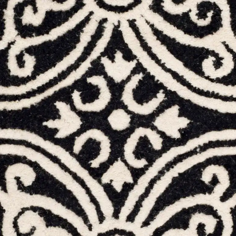 Cambridge Tile Hand-Tufted Wool Rug in Black / Ivory in a styled room