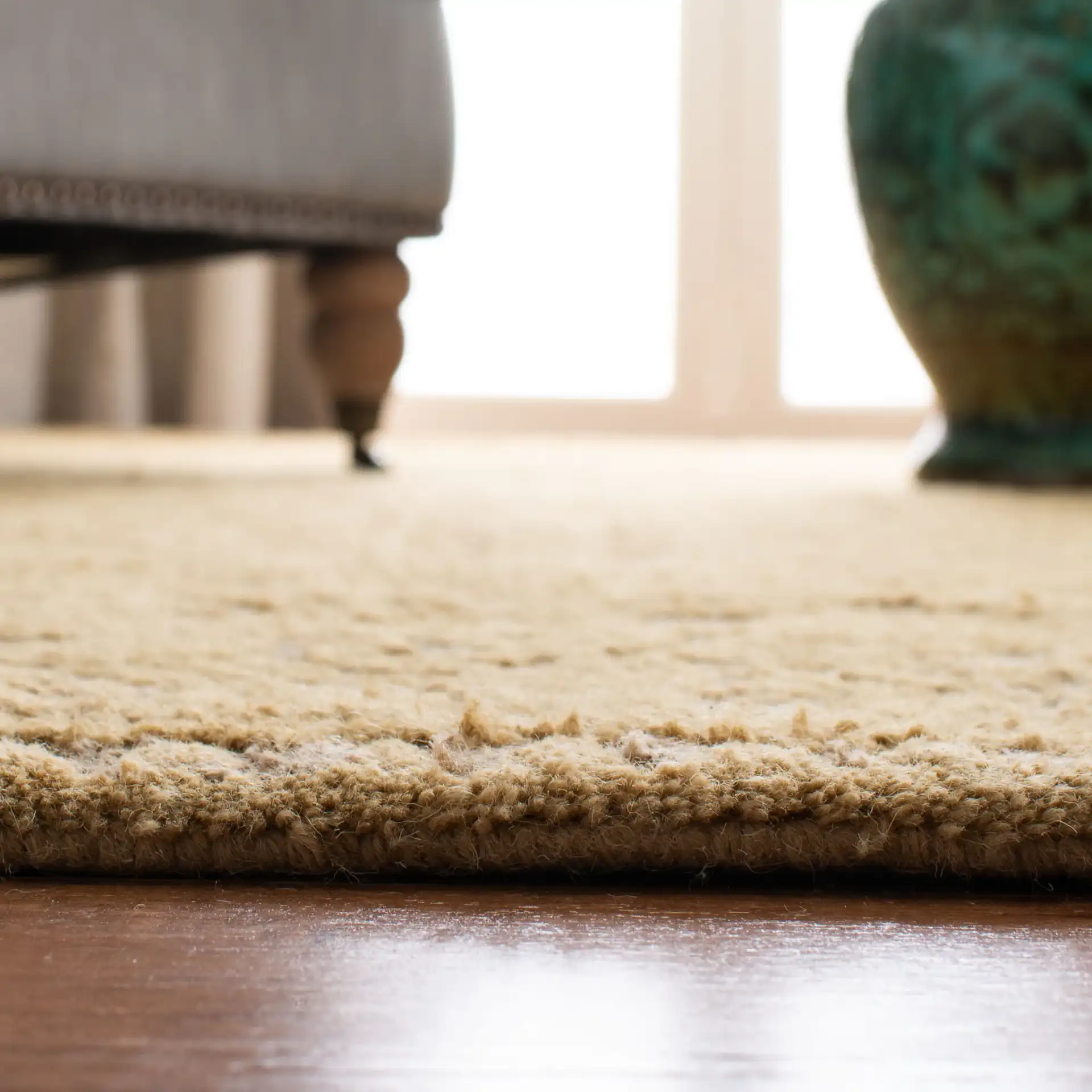 Cambridge Interlocking Circle Hand-Tufted Wool Rug in Light Gold / Dark Gold in a styled room
