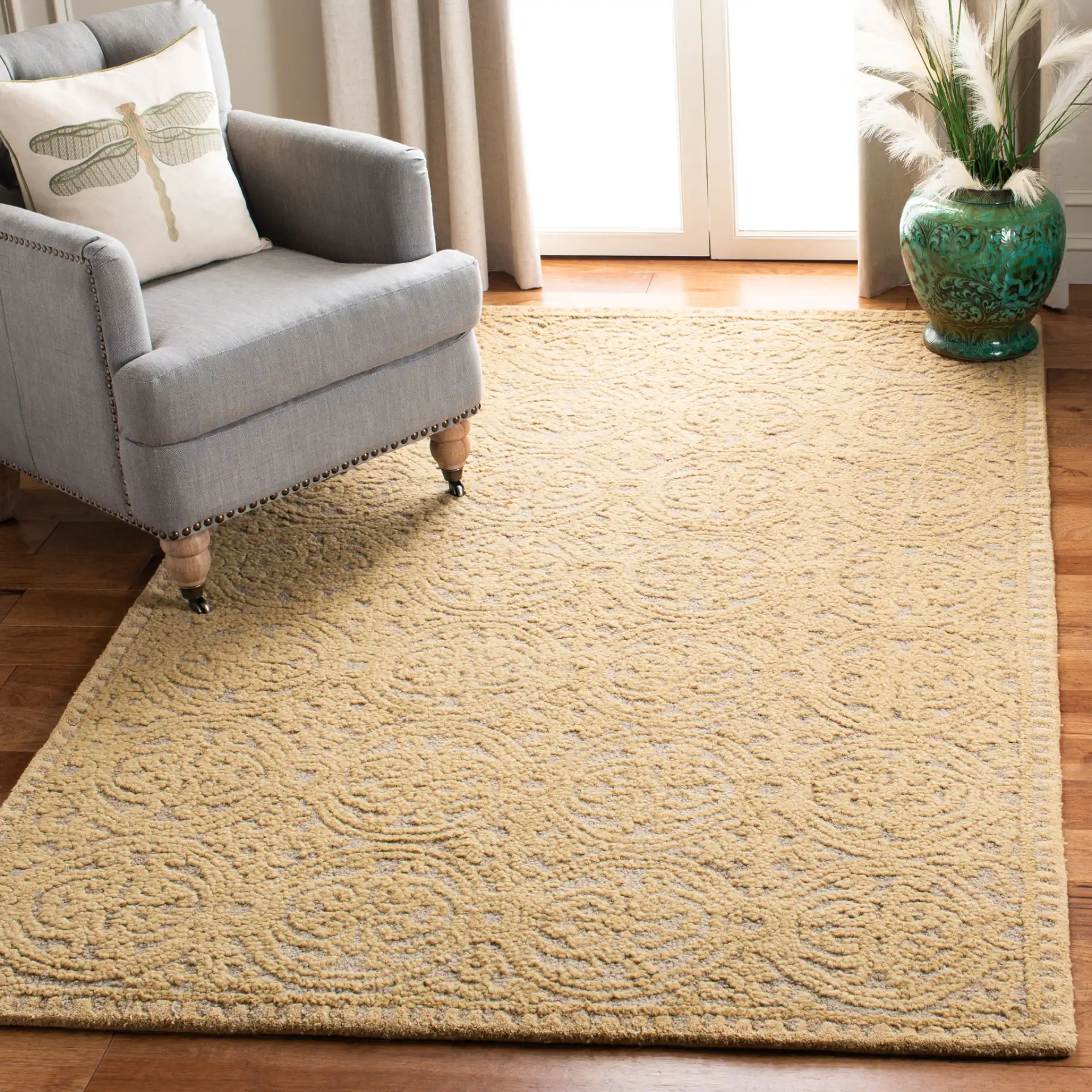 Cambridge Interlocking Circle Hand-Tufted Wool Rug in Light Gold / Dark Gold in a styled room