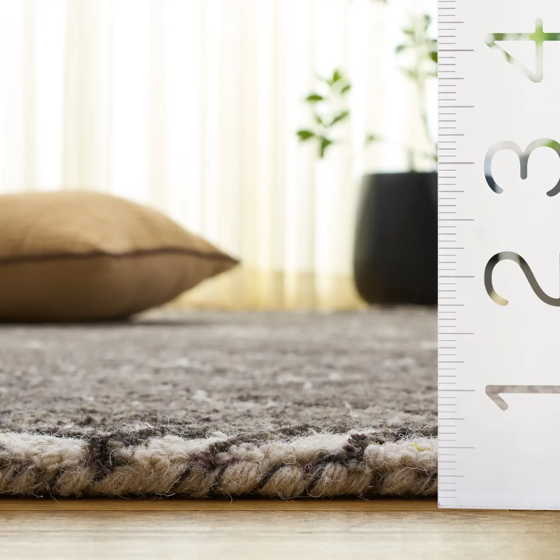Cambridge Diamond Grid Hand-Tufted Wool Rug in Ivory / Charcoal in a styled room