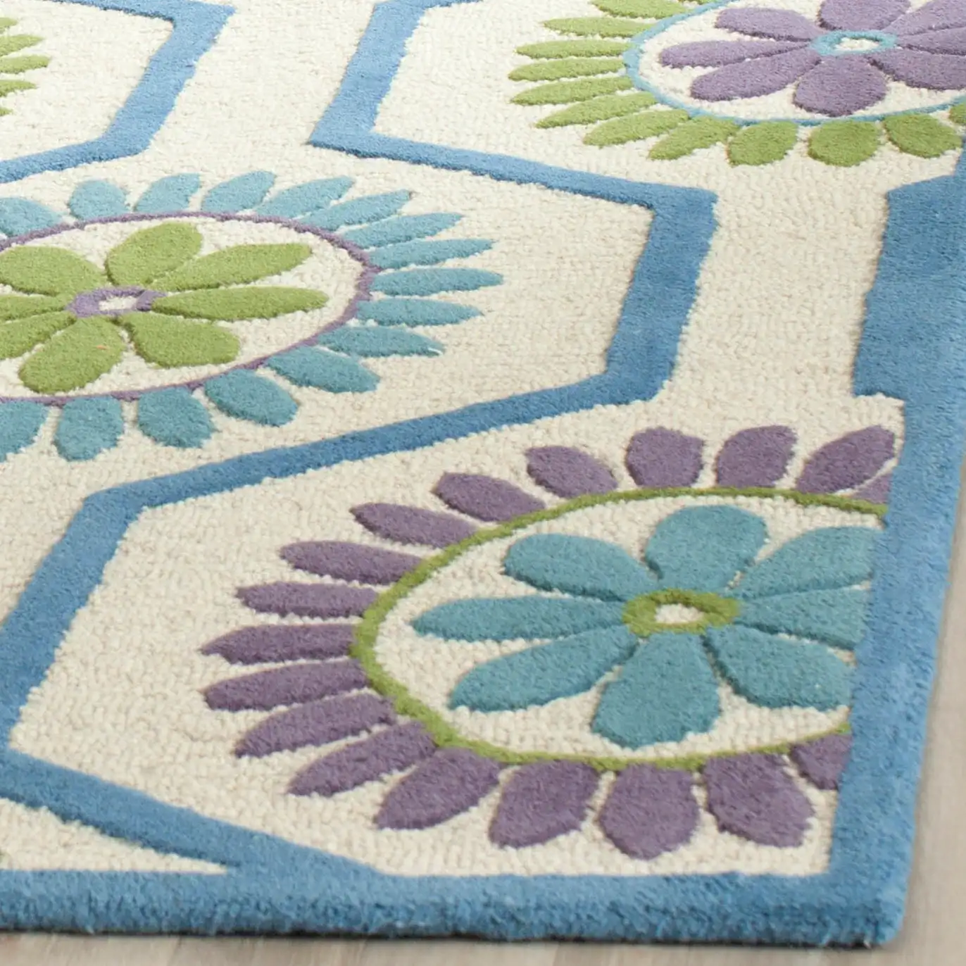Cambridge Floral Honeycomb Hand-Tufted Wool Rug in Ivory / Blue in a styled room