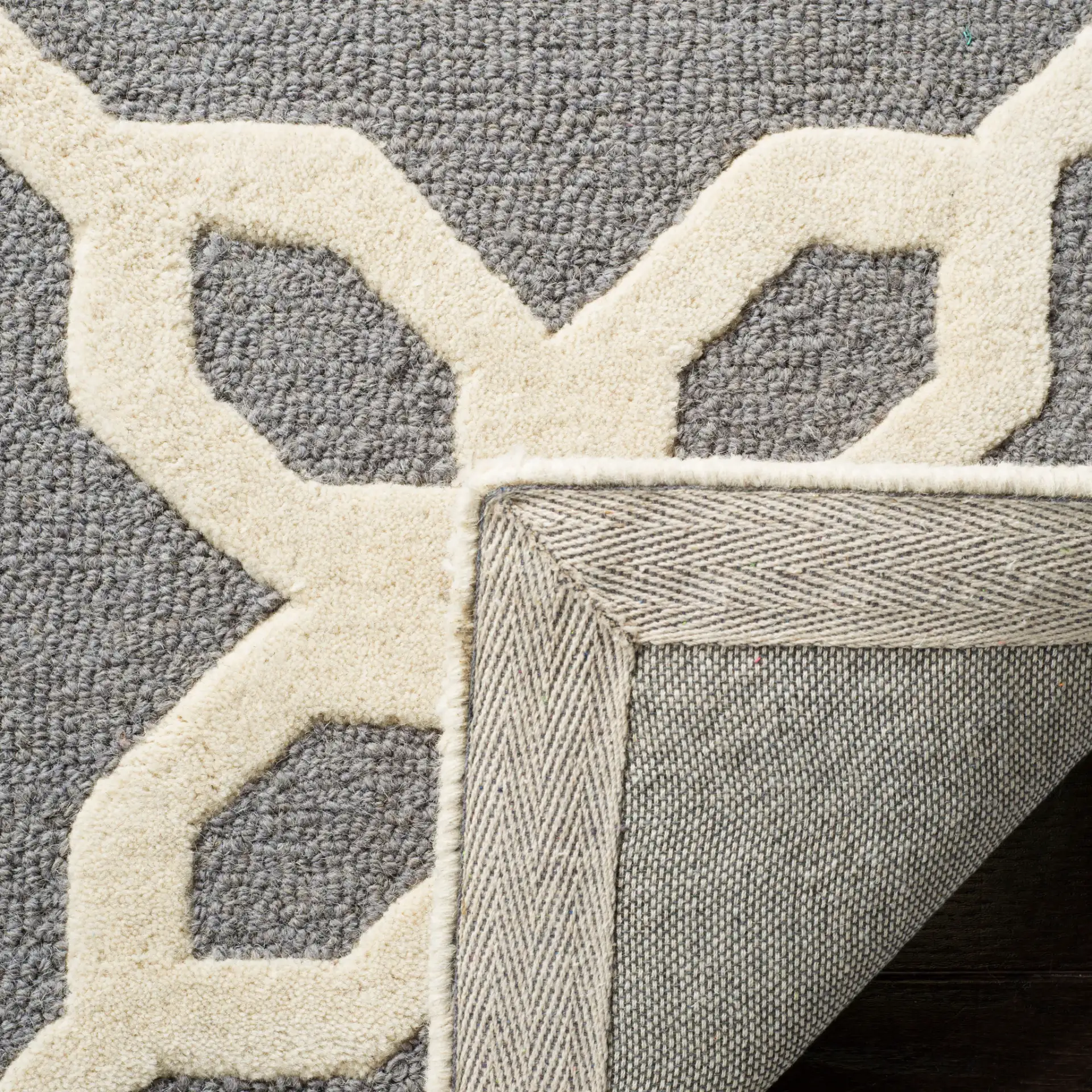 Cambridge Floral Trellis Hand-Tufted Wool Rug in Dark Gray / Ivory in a styled room