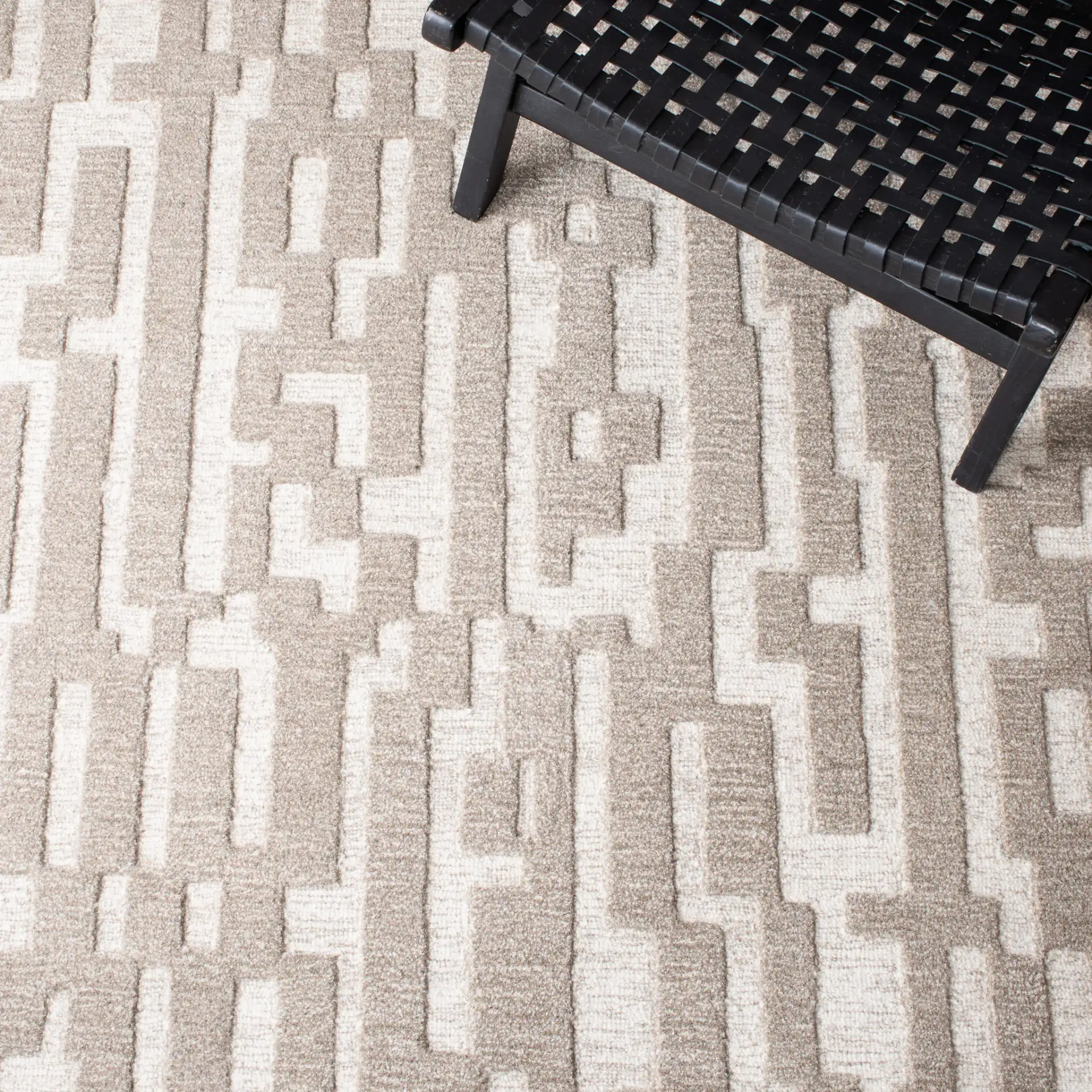 Cambridge Stepped Block Hand-Tufted Wool Rug in Beige / Gray in a styled room