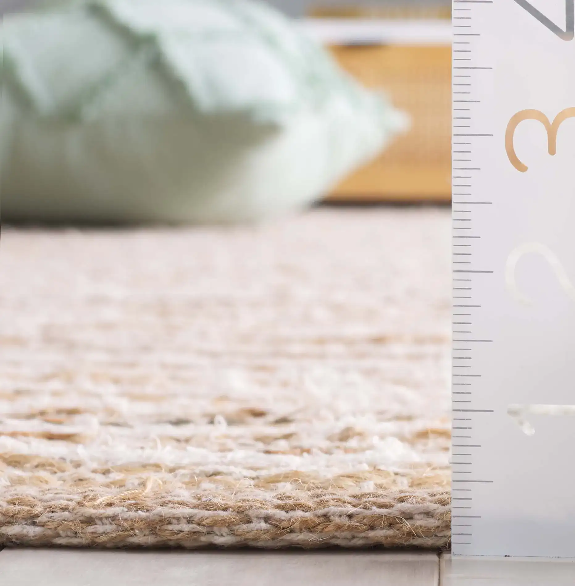 Cape Cod Linear Stripe Hand-Woven Rug in Natural / Beige in a styled room