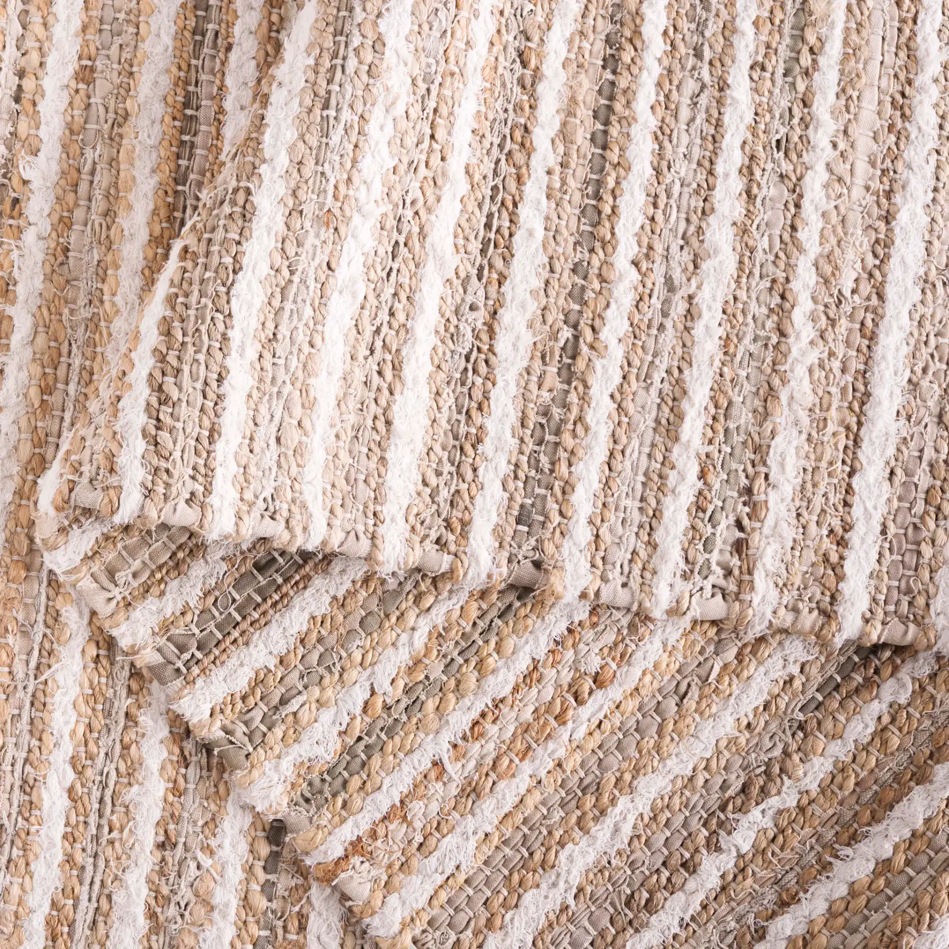 Cape Cod Linear Stripe Hand-Woven Rug in Natural / Beige in a styled room