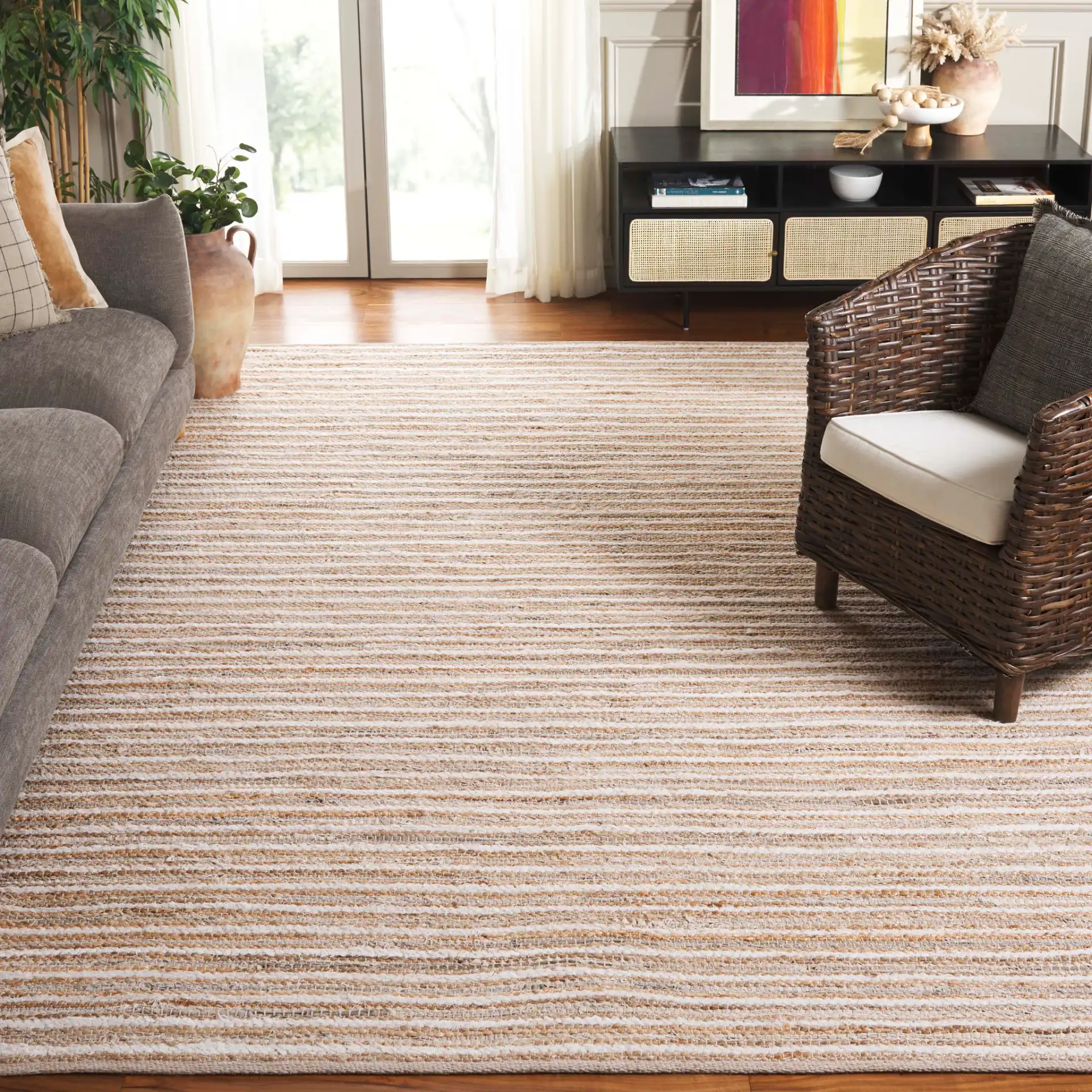 Cape Cod Linear Stripe Hand-Woven Rug in Natural / Beige in a styled room