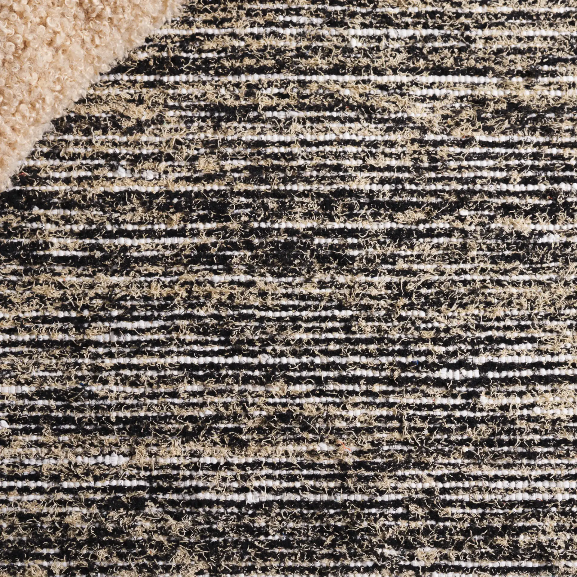 Cape Cod Striped Hand-Woven Rug in Beige / Black in a styled room