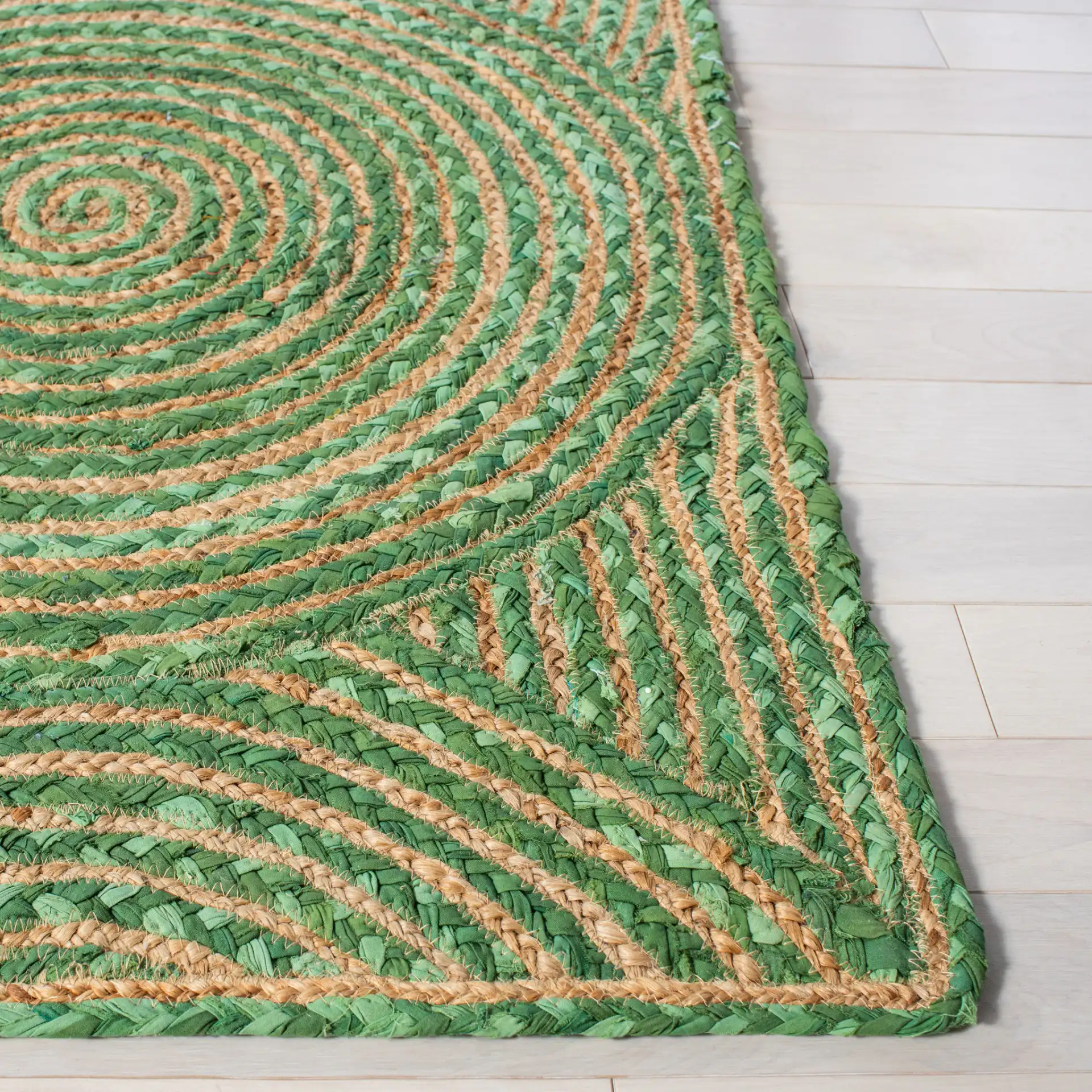 Cape Cod Concentric Circles Hand-Woven Rug in Green / Natural in a styled room