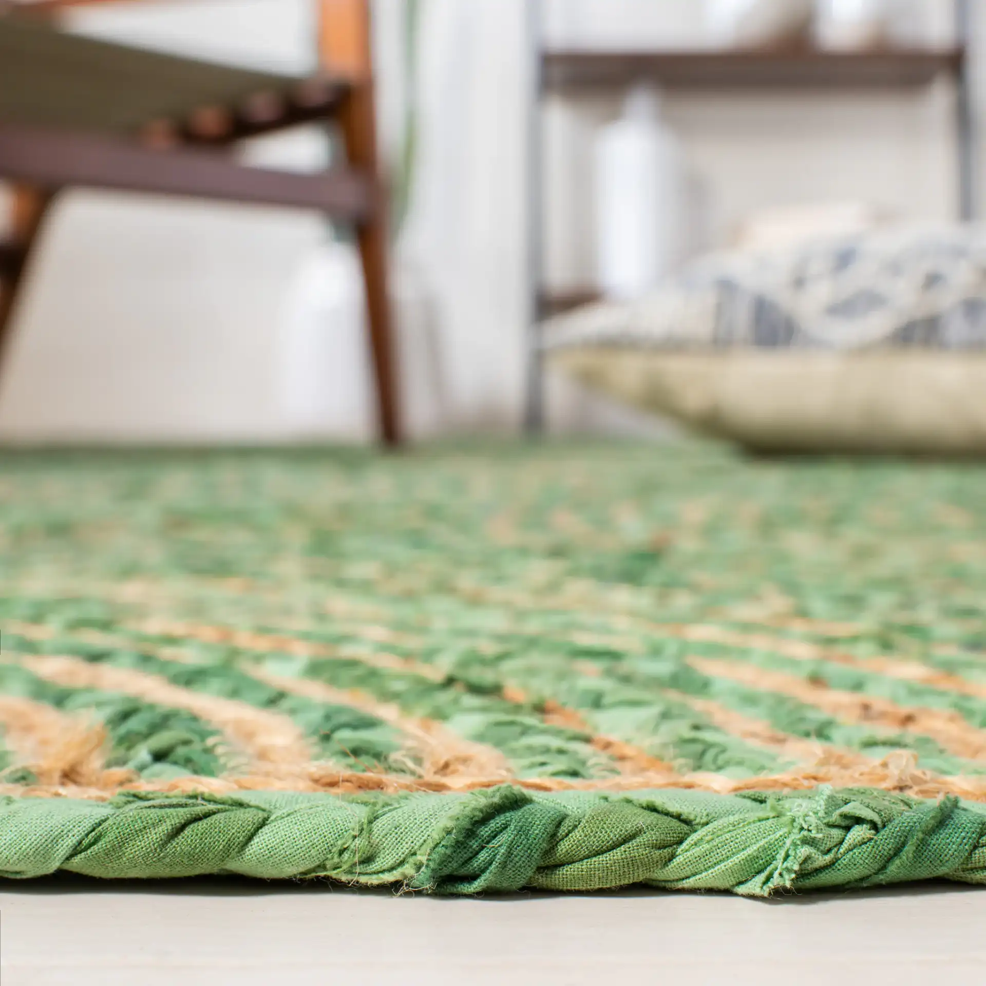 Cape Cod Concentric Circles Hand-Woven Rug in Green / Natural in a styled room