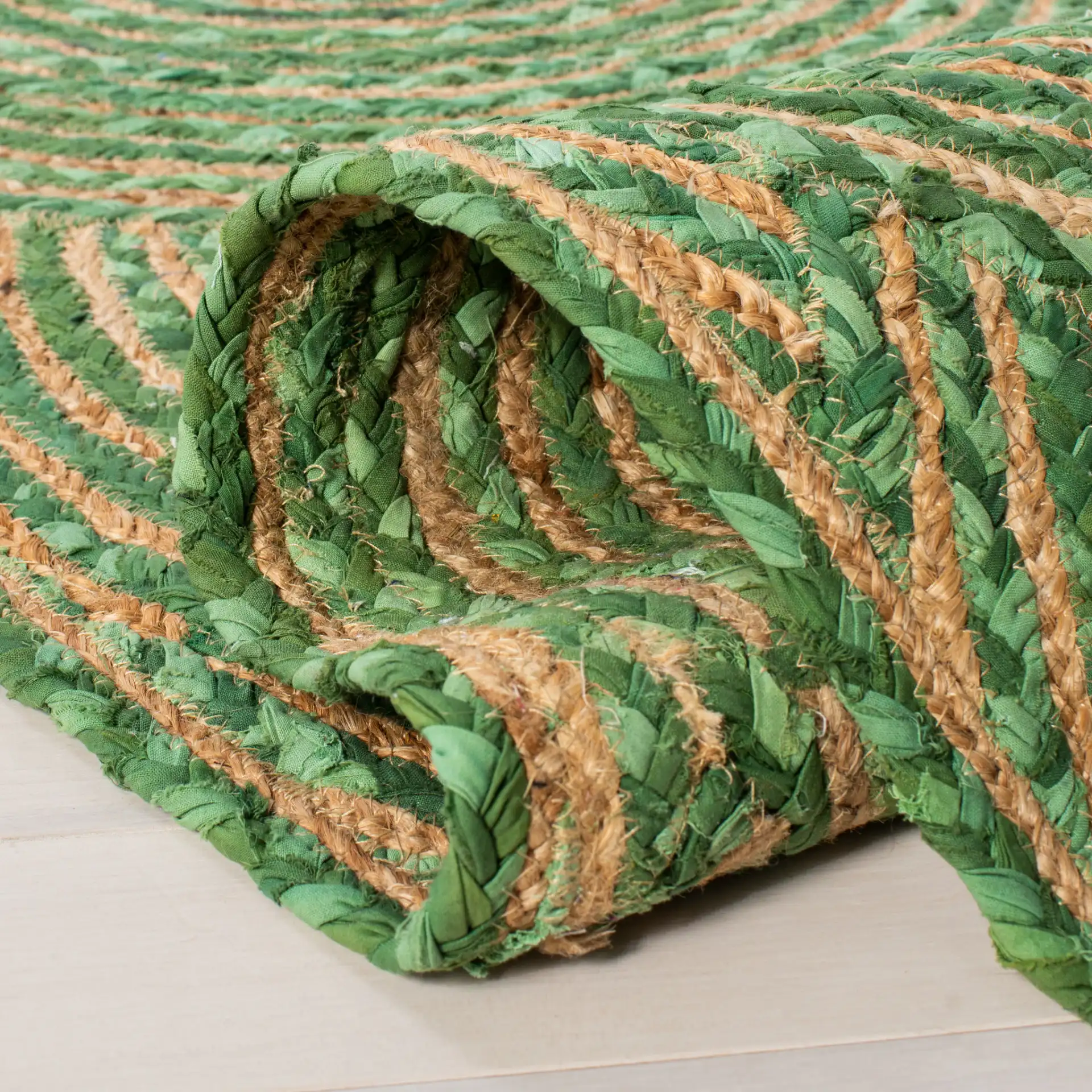 Cape Cod Concentric Circles Hand-Woven Rug in Green / Natural in a styled room