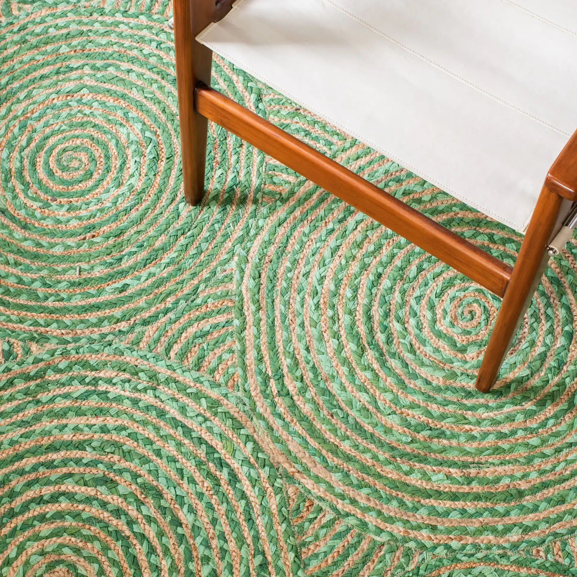 Cape Cod Concentric Circles Hand-Woven Rug in Green / Natural in a styled room