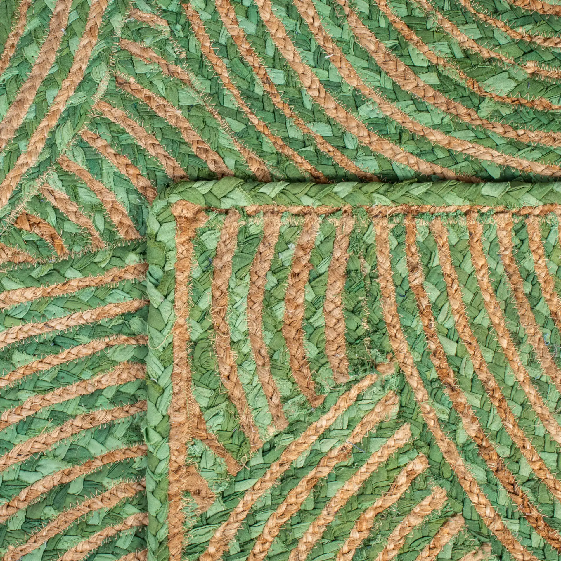 Cape Cod Concentric Circles Hand-Woven Rug in Green / Natural in a styled room