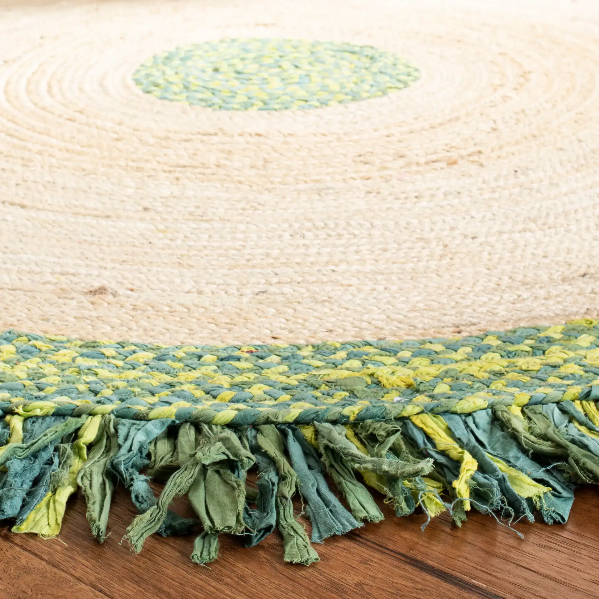 Cape Cod Banded Fringe Braided Hand-Woven Rug in Green / Natural in a styled room