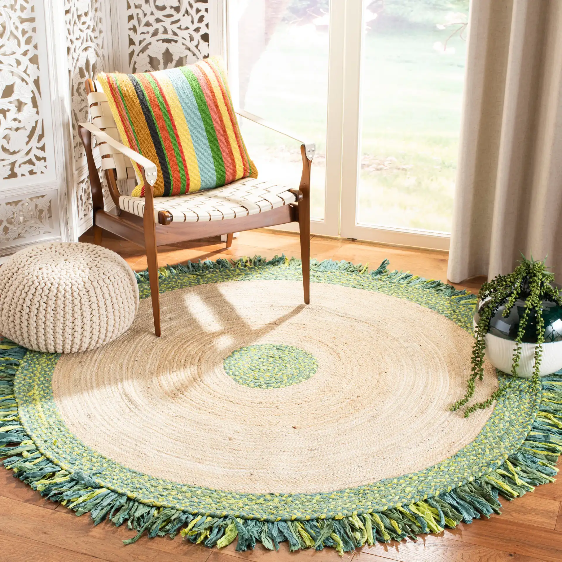 Cape Cod Banded Fringe Braided Hand-Woven Rug in Green / Natural in a styled room