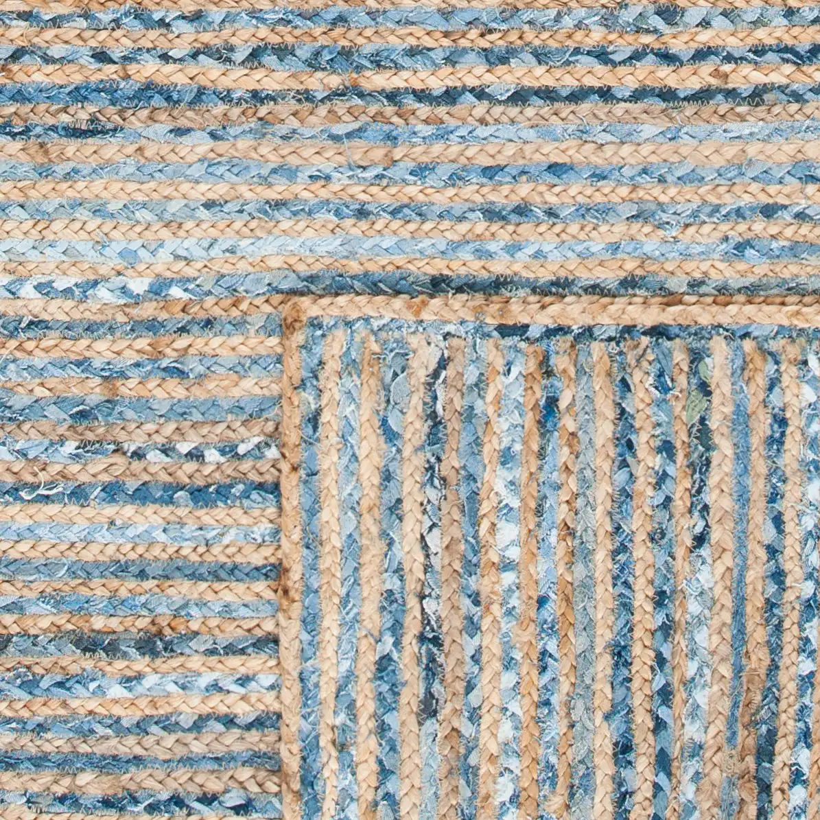 Cape Cod Braided Stripe Hand-Woven Rug in Natural / Blue in a styled room
