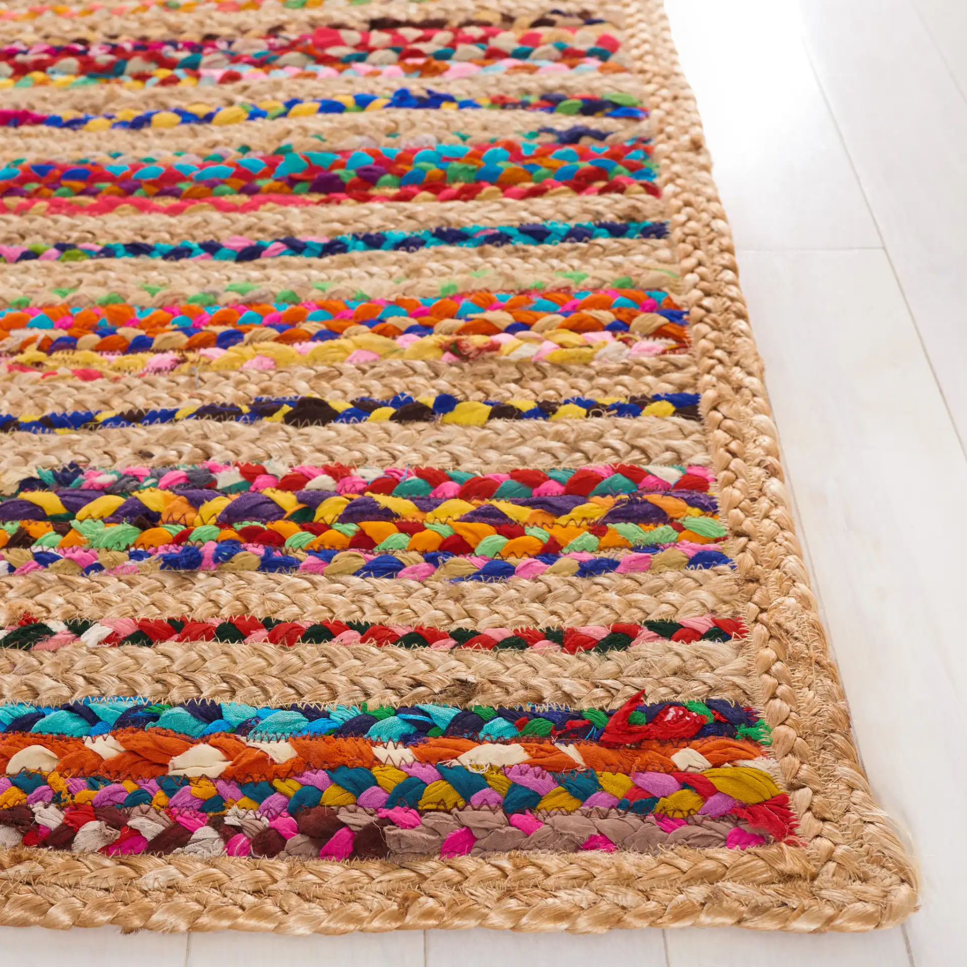 Cape Cod Heathered Thin Stripe Hand-Woven Rug in Natural / Multicolor in a styled room