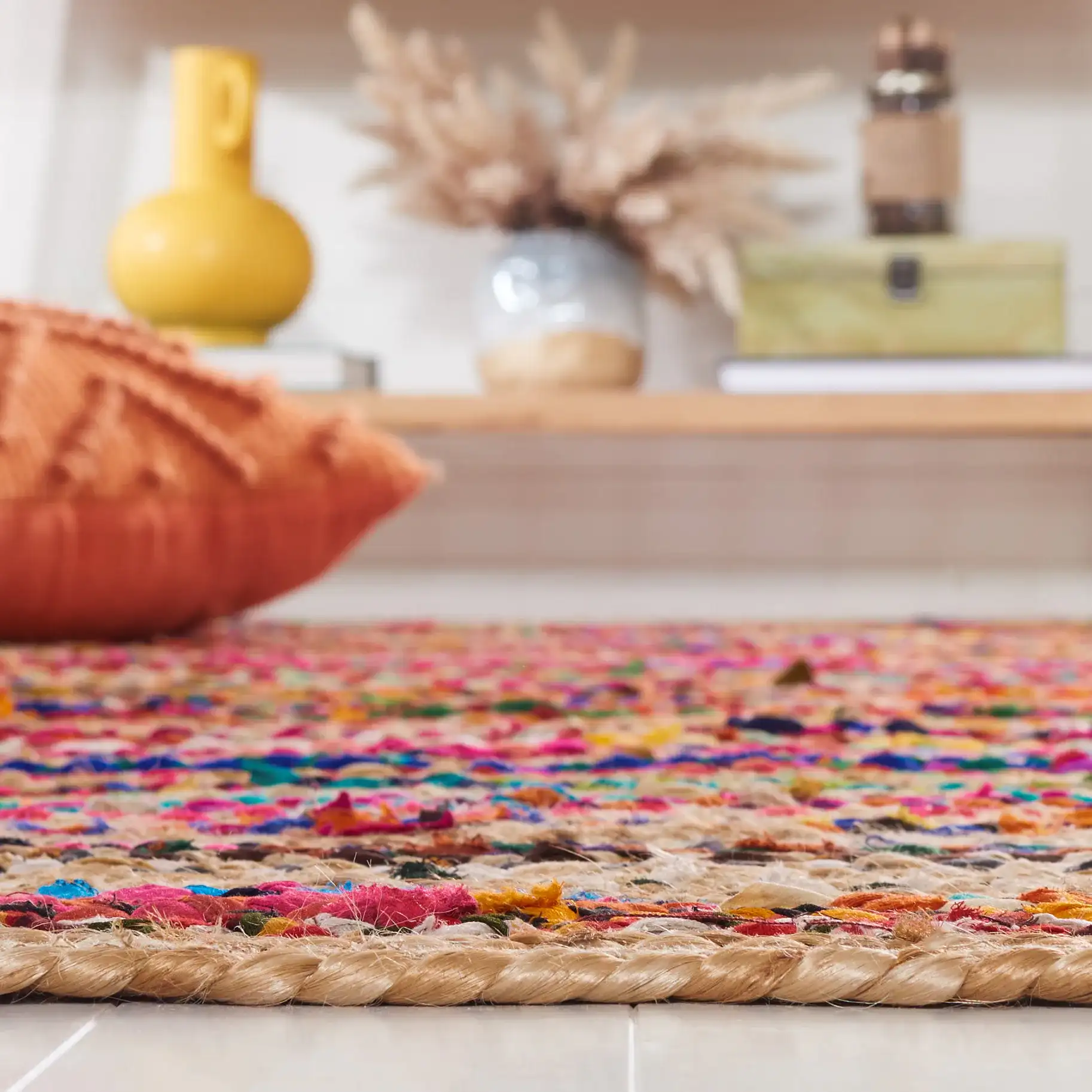 Cape Cod Heathered Thin Stripe Hand-Woven Rug in Natural / Multicolor in a styled room