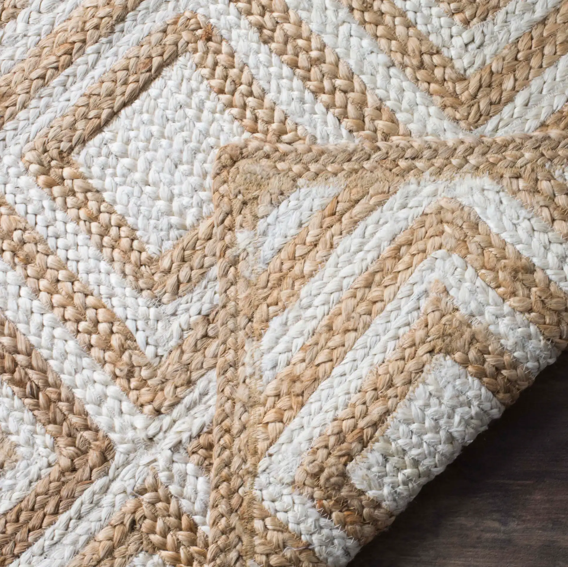 Cape Cod Nested Diamond Hand-Woven Jute Rug in Natural / Ivory in a styled room