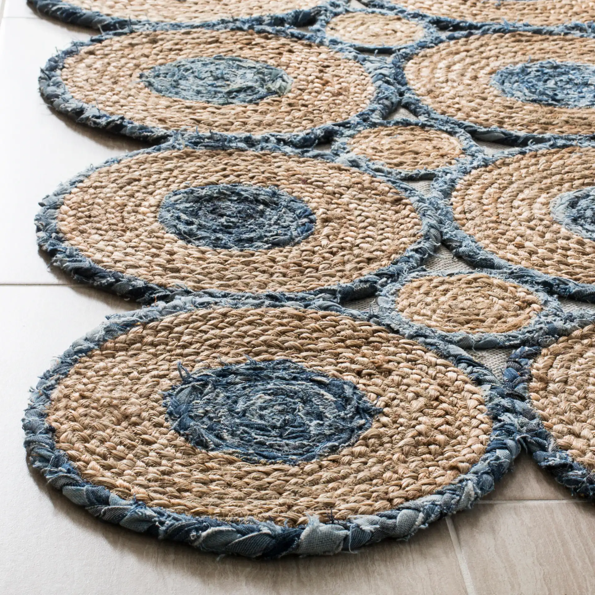 Cape Cod Interlocking Circles Hand-Woven Rug in Blue / Natural in a styled room