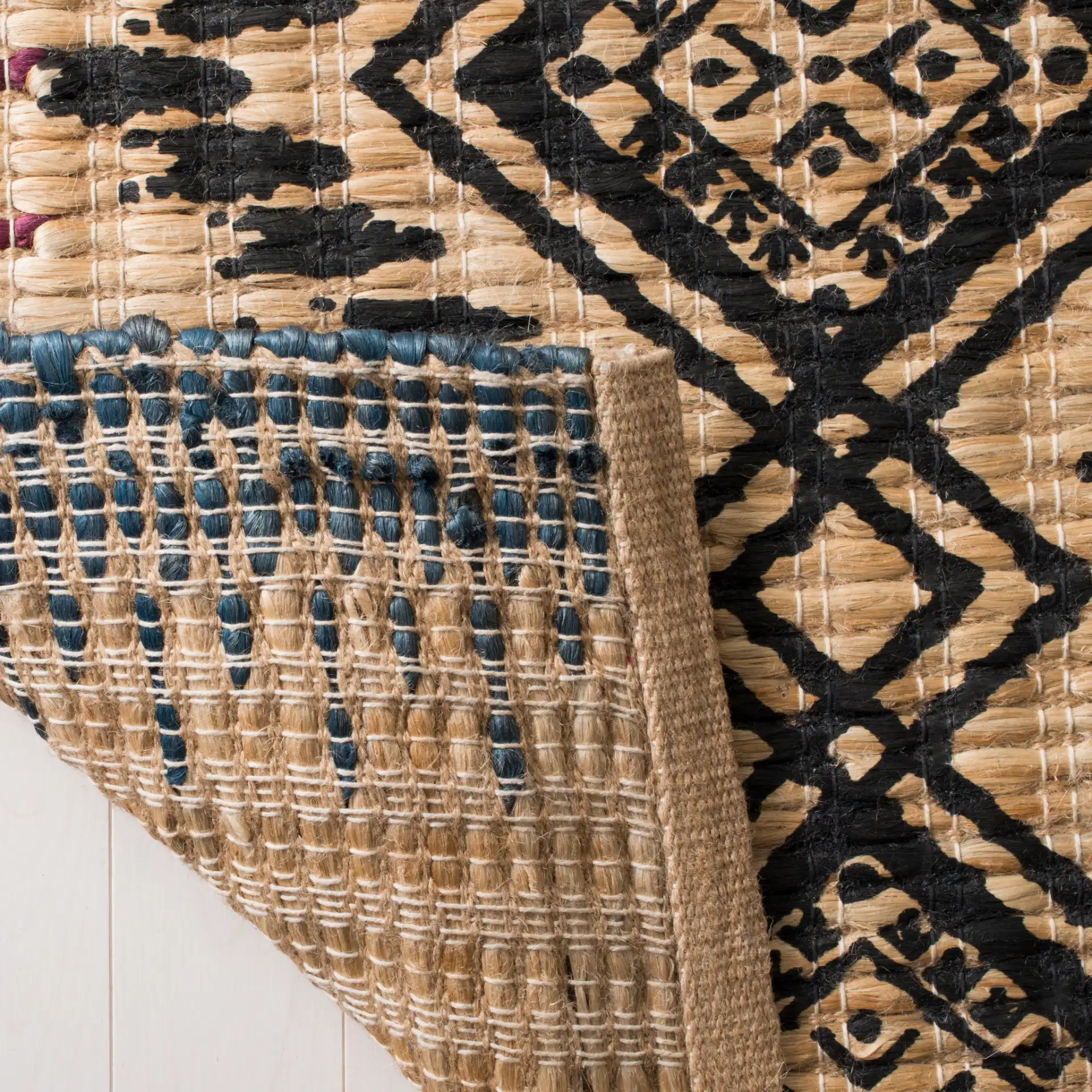 Cape Cod Diamond Stripe Hand-Woven Rug in Natural / Black in a styled room