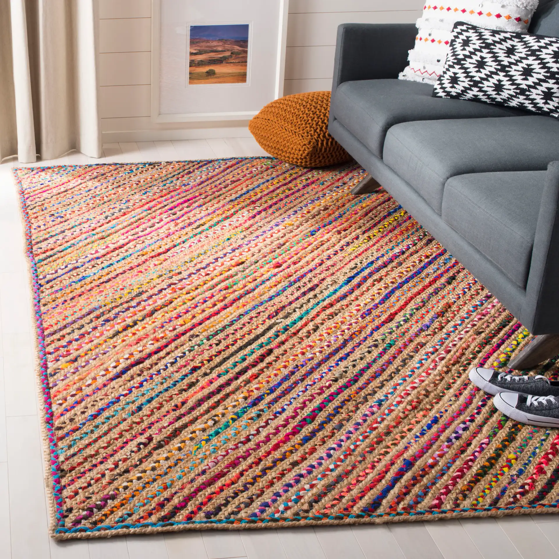 Cape Cod Diagonal Stripe Hand-Woven Rug in Natural / Red in a styled room