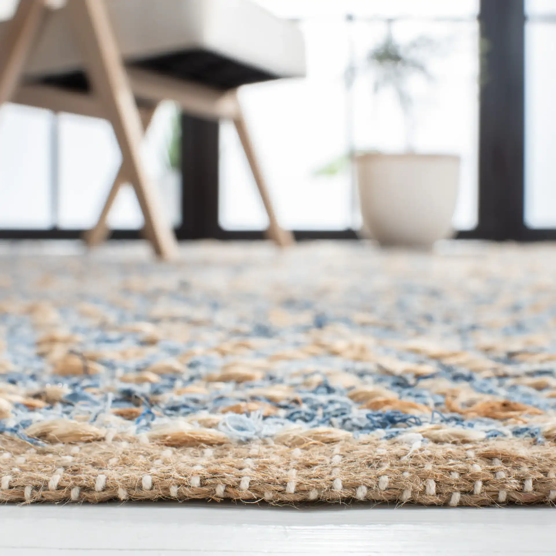 Cape Cod Striated Hand-Woven Rug in Natural / Blue in a styled room