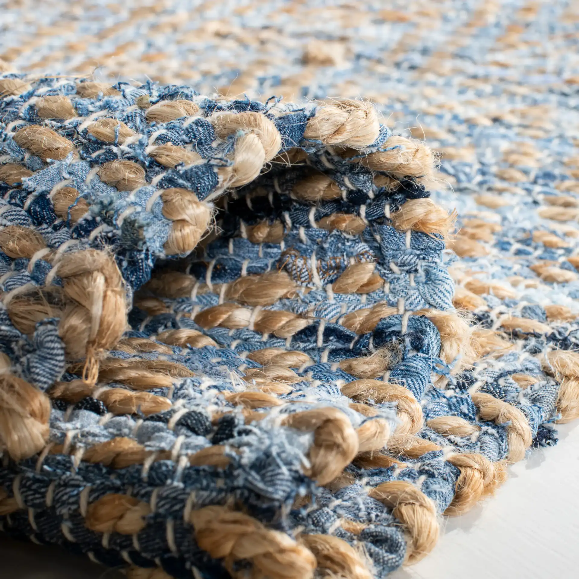 Cape Cod Striated Hand-Woven Rug in Natural / Blue in a styled room