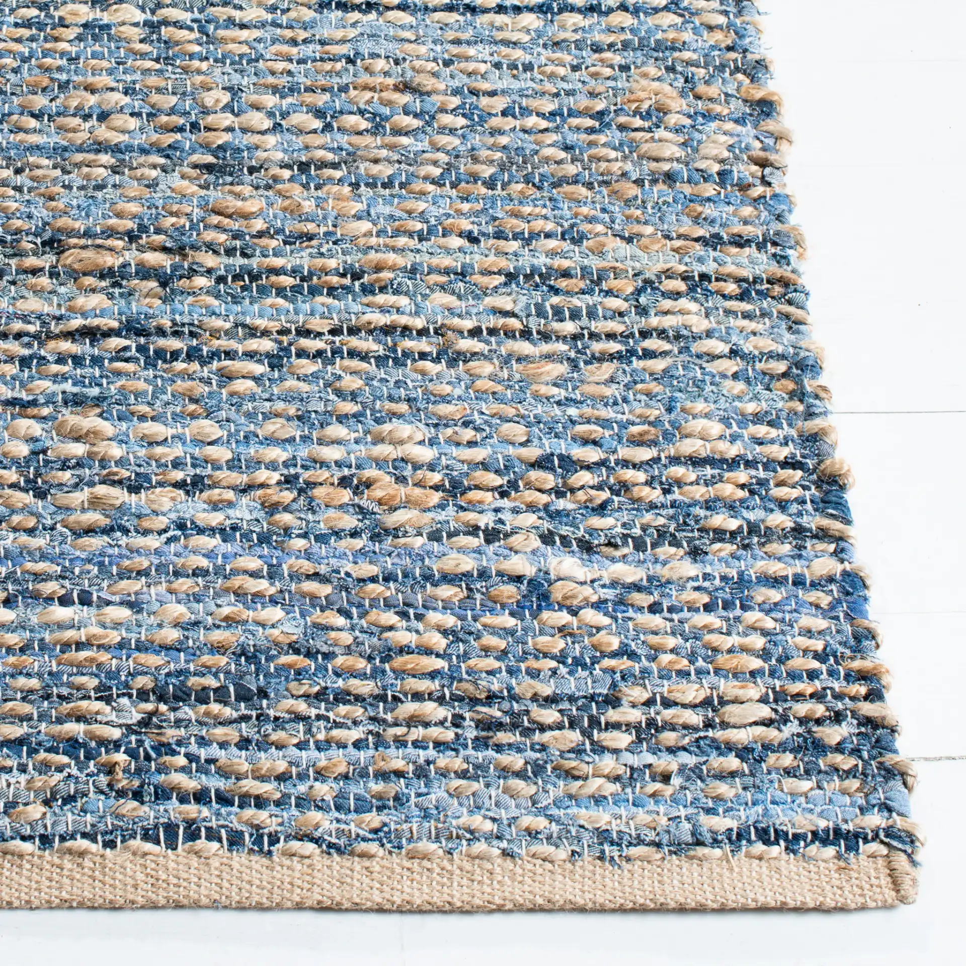 Cape Cod Heathered Stripe Hand-Woven Rug in Natural / Blue in a styled room